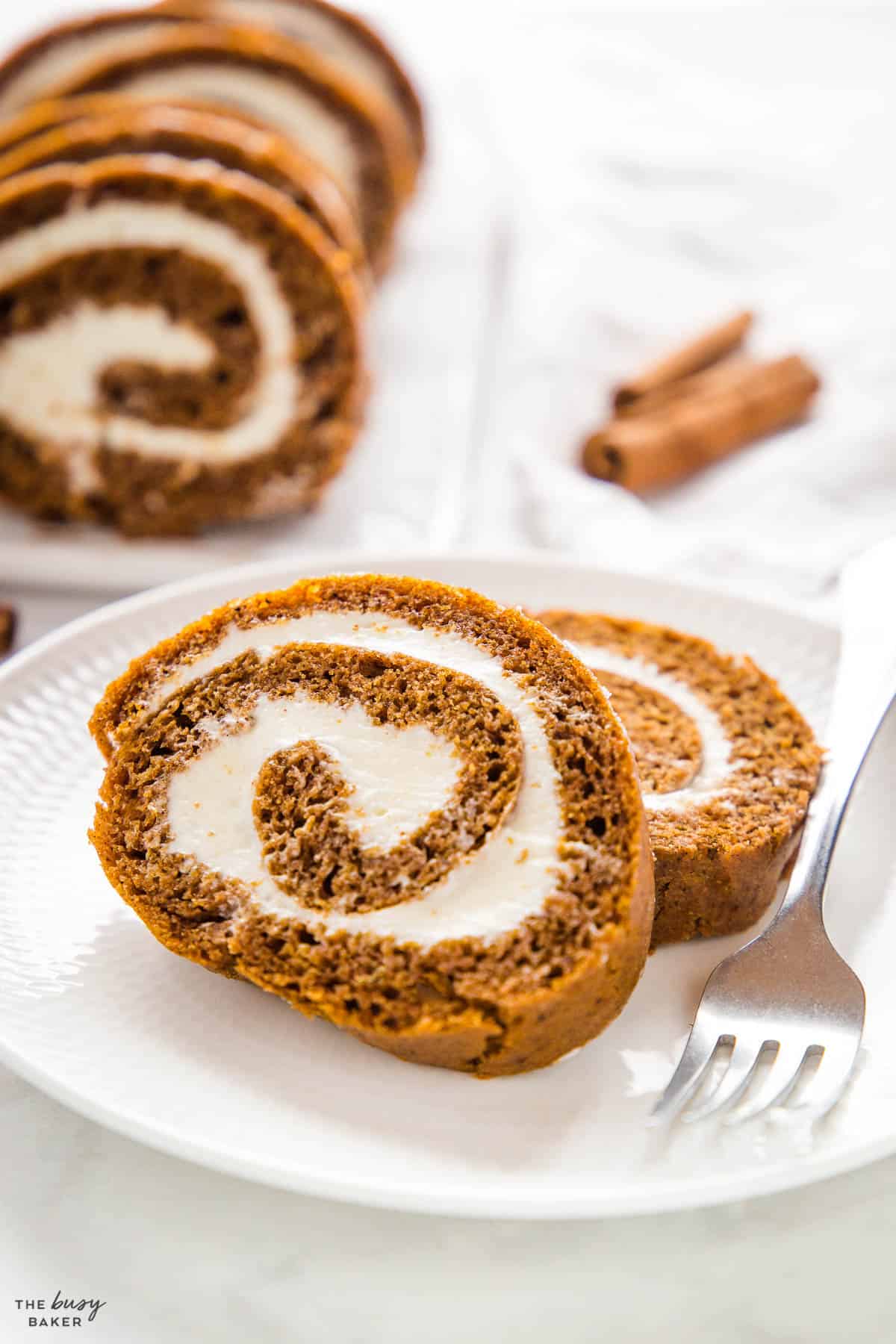 pumpkin roll cake slices on white plate
