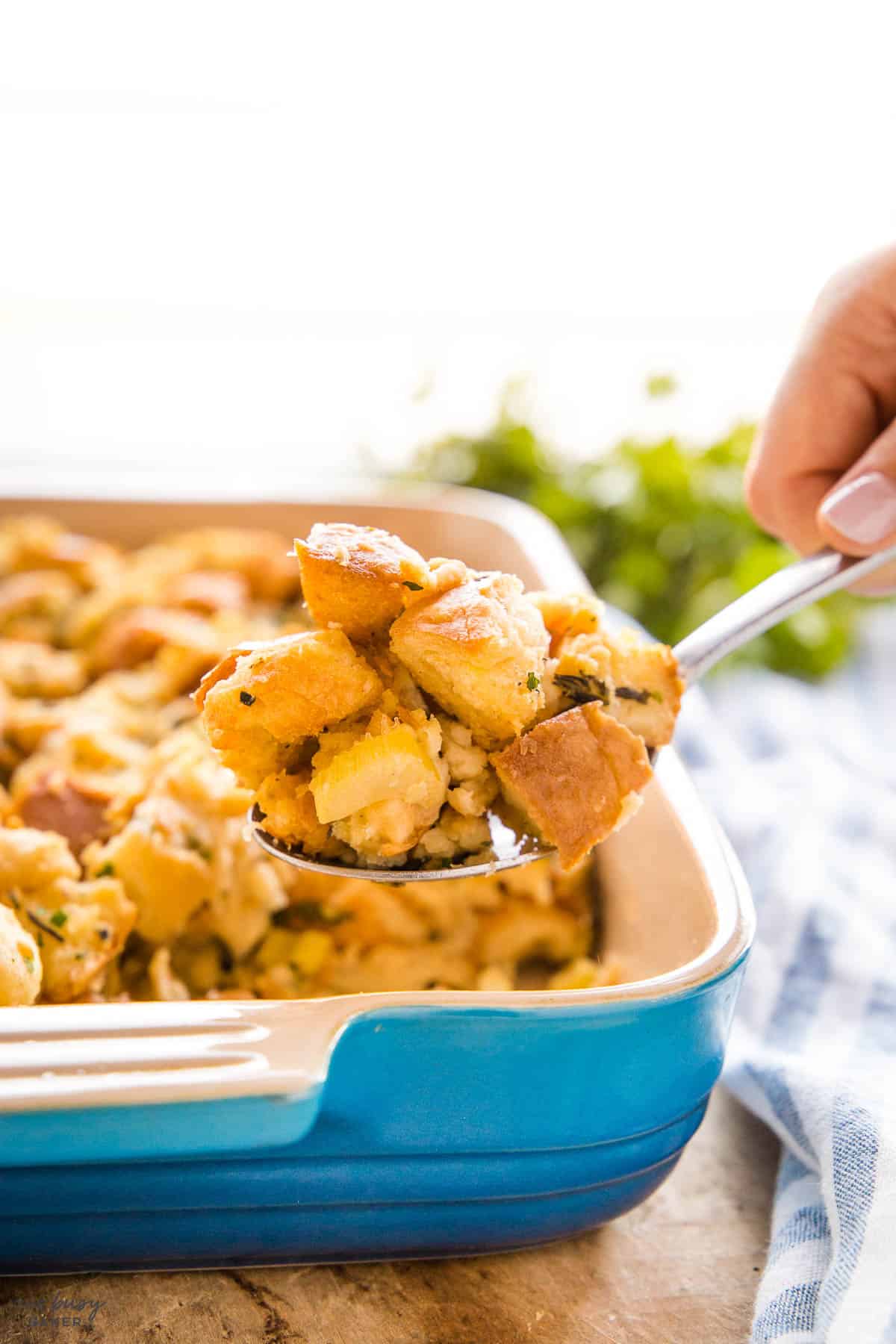 hand serving thanksgiving holiday dressing