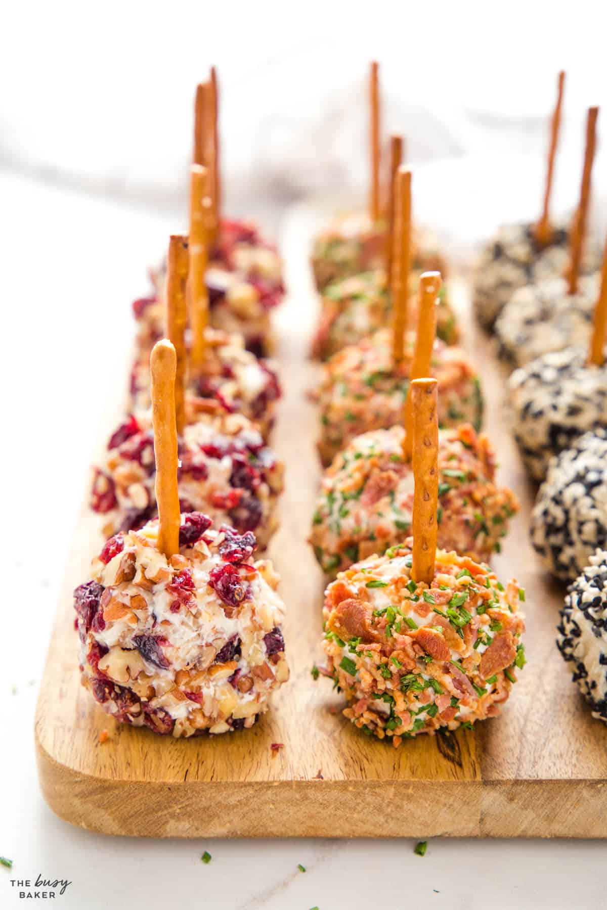 mini cheese balls with cranberry, pecans, bacon and chives