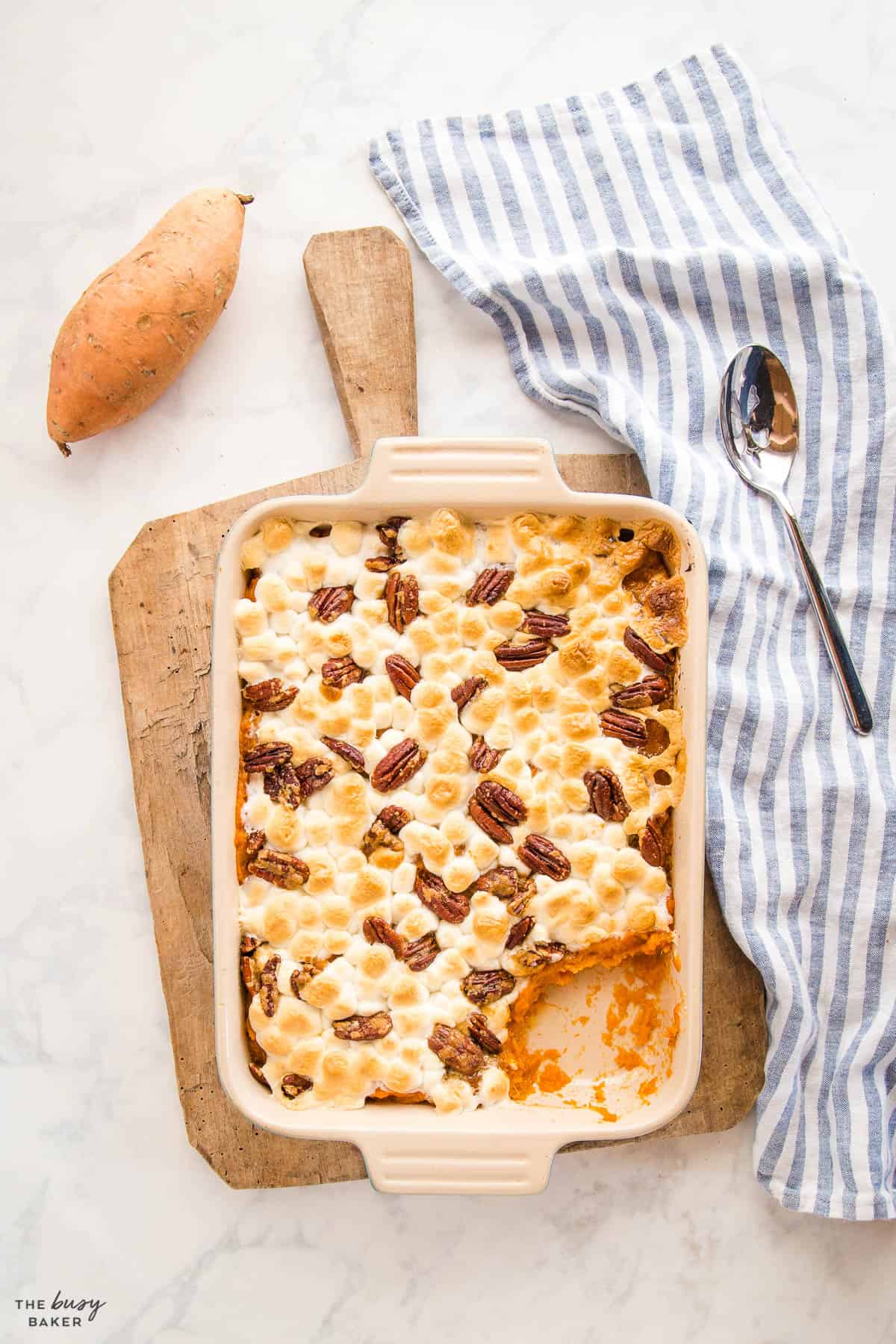 overhead image: sweet potato casserole with marshmallows and pecans