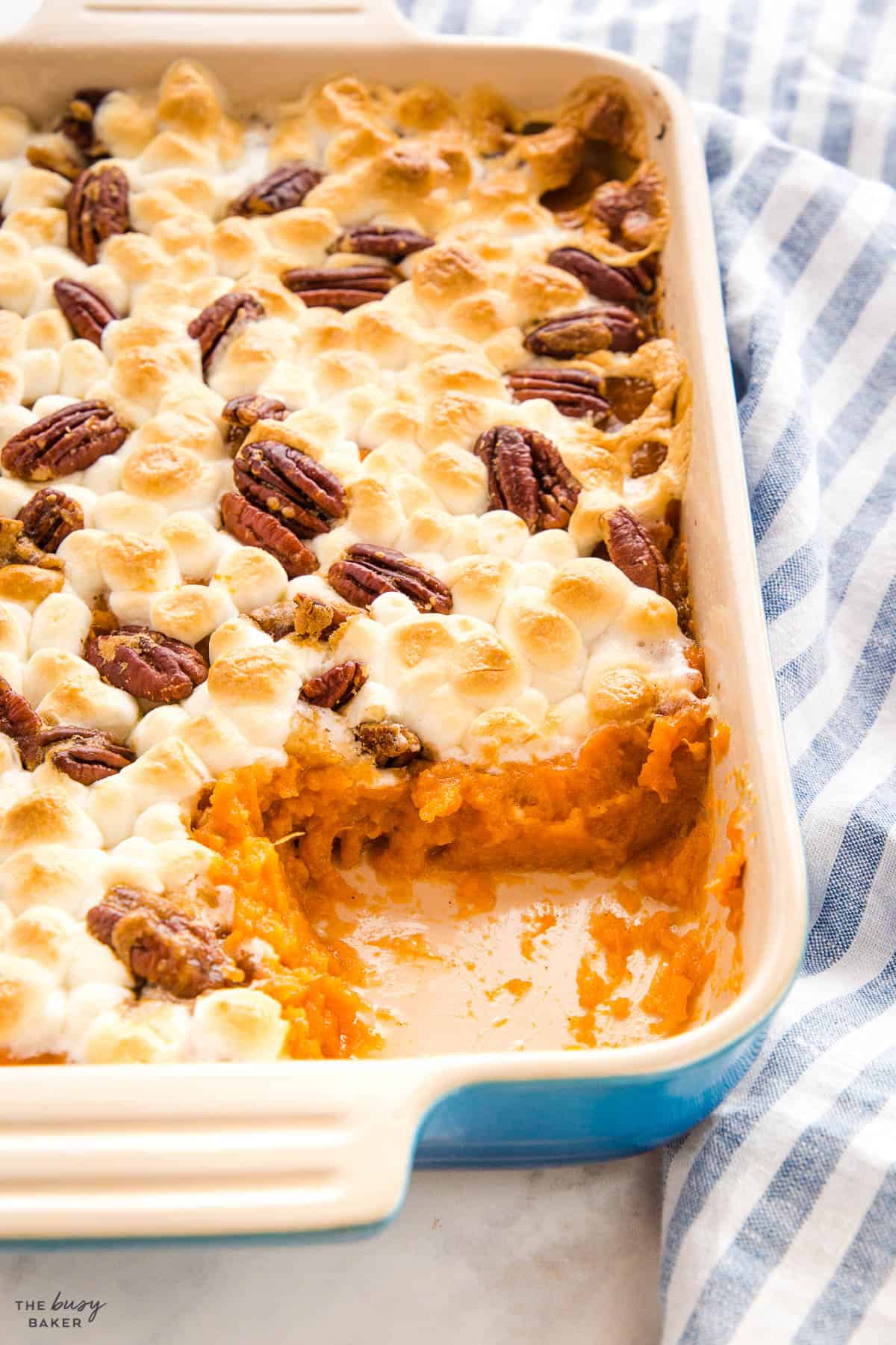 baked sweet potato casserole with marshmallows and pecans