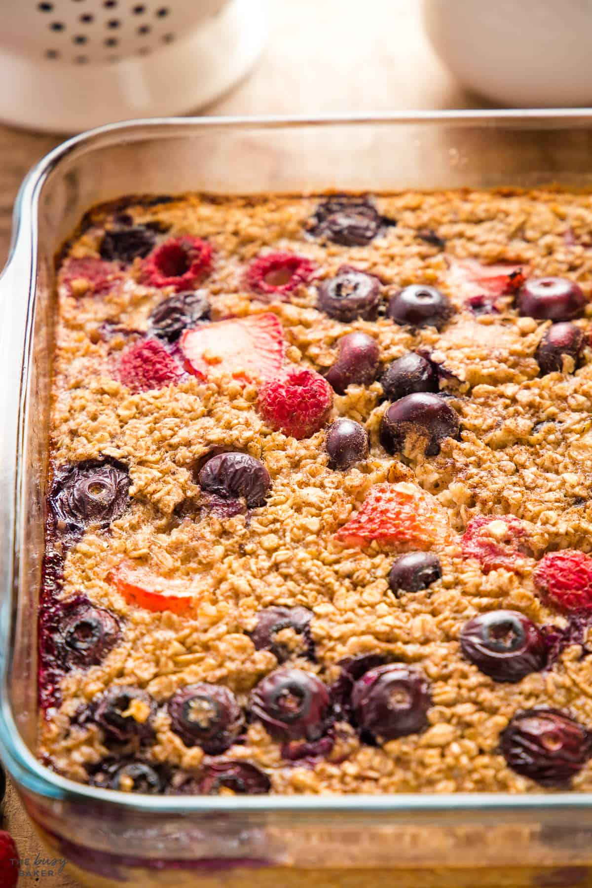 baking pan with oatmeal bake and berries