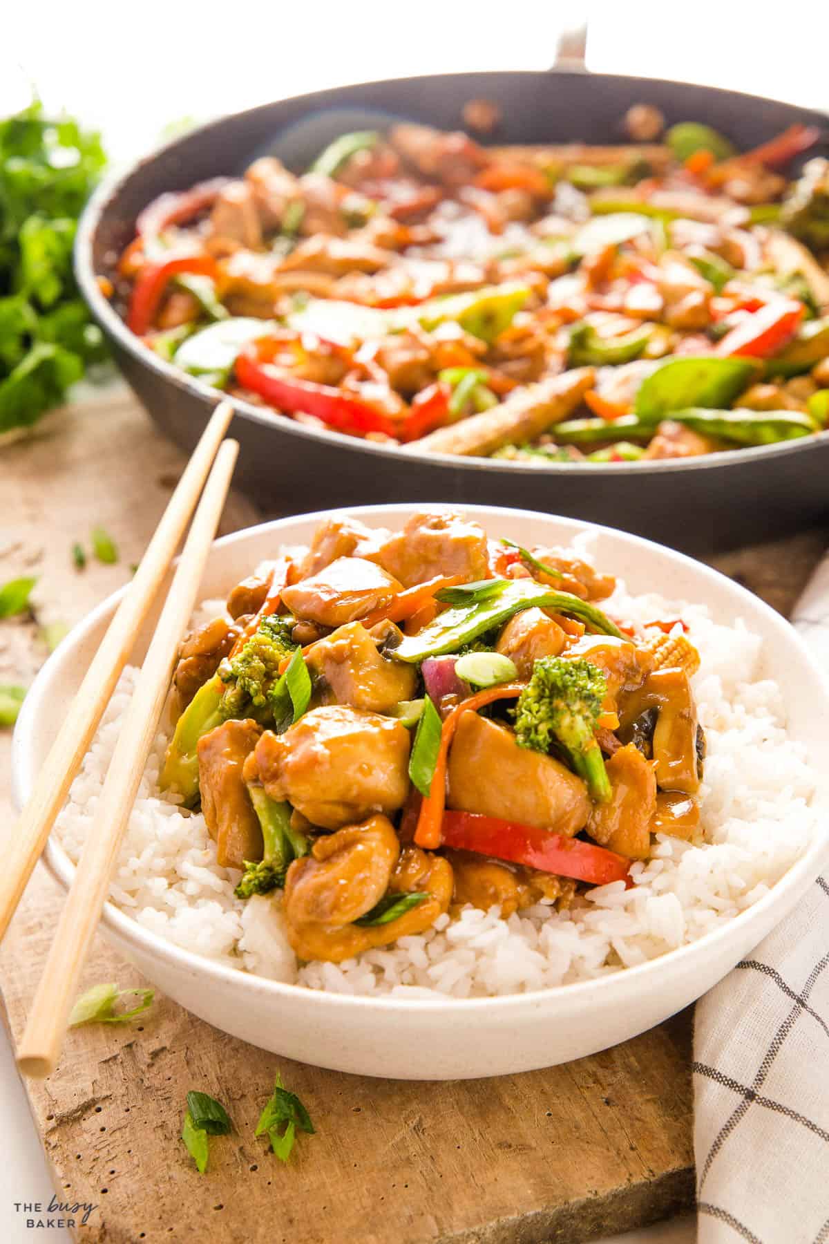 bowl of rice with chicken and veggies
