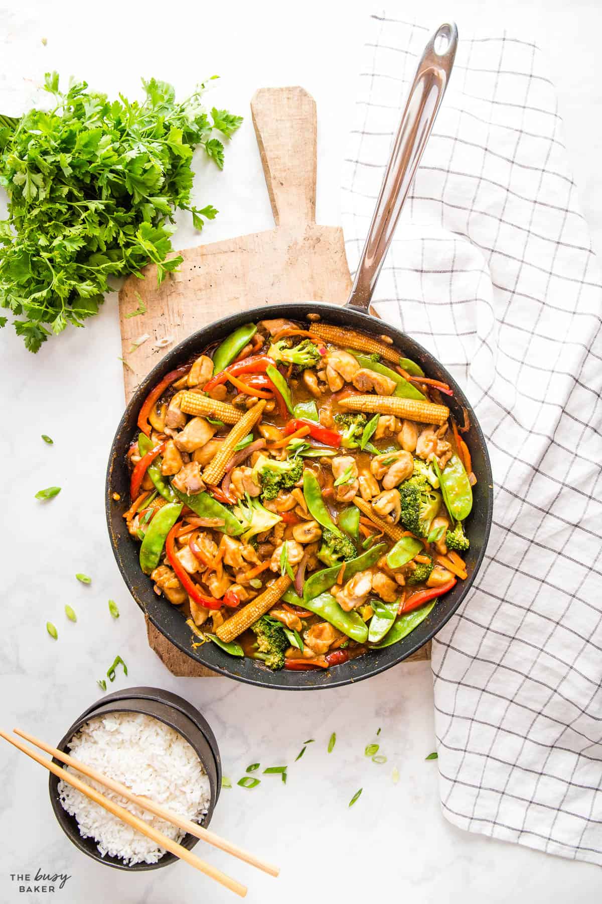healthy family meal in a skillet with protein and veggies