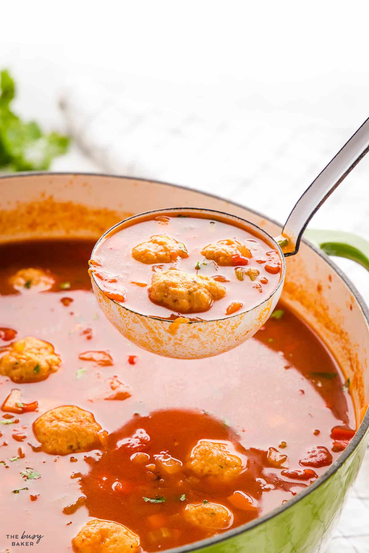 a soup ladle of meatball soup or ciorba de perisoare
