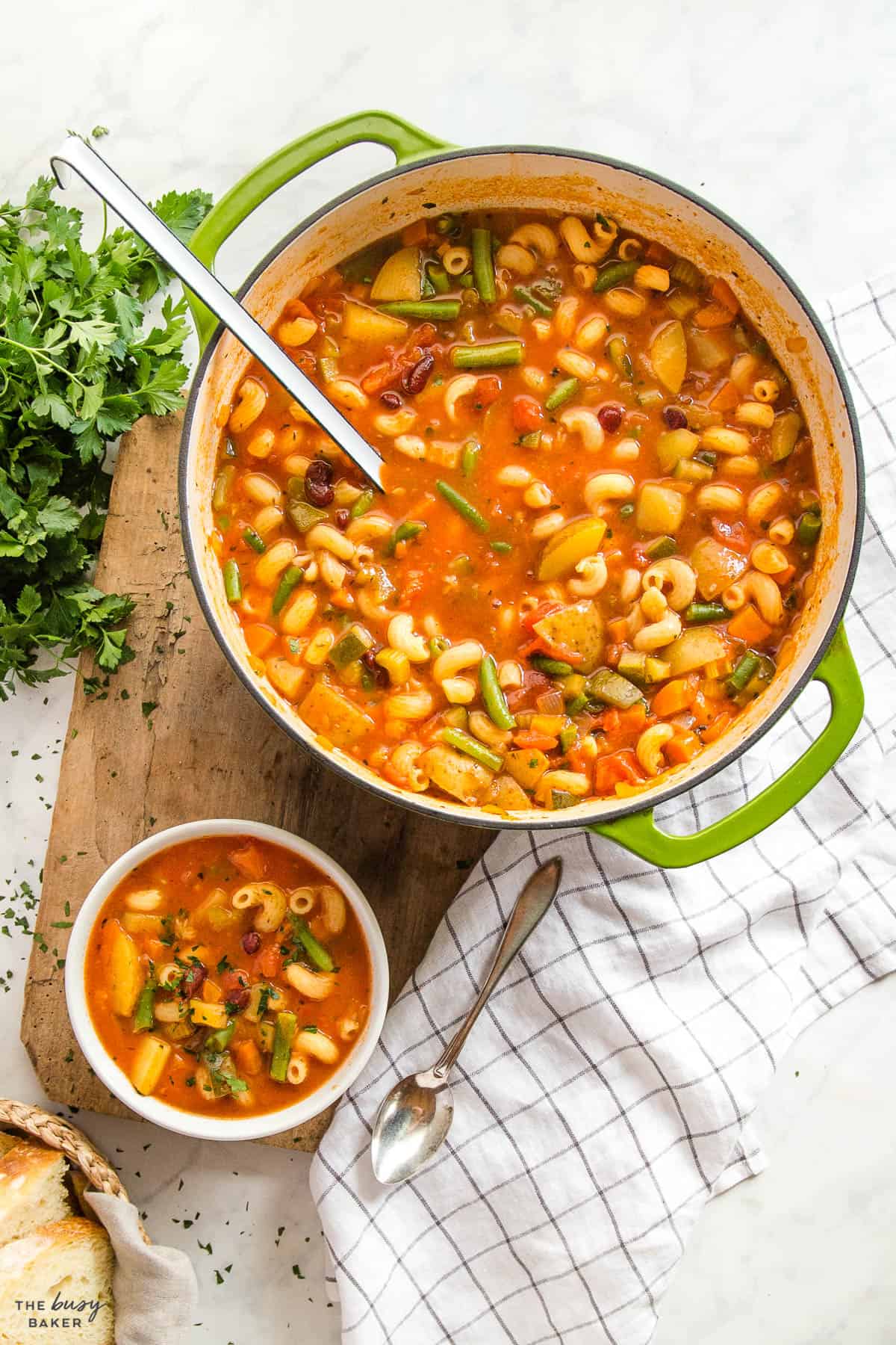overhead image: pot of minestrone soup with pasta and veggies