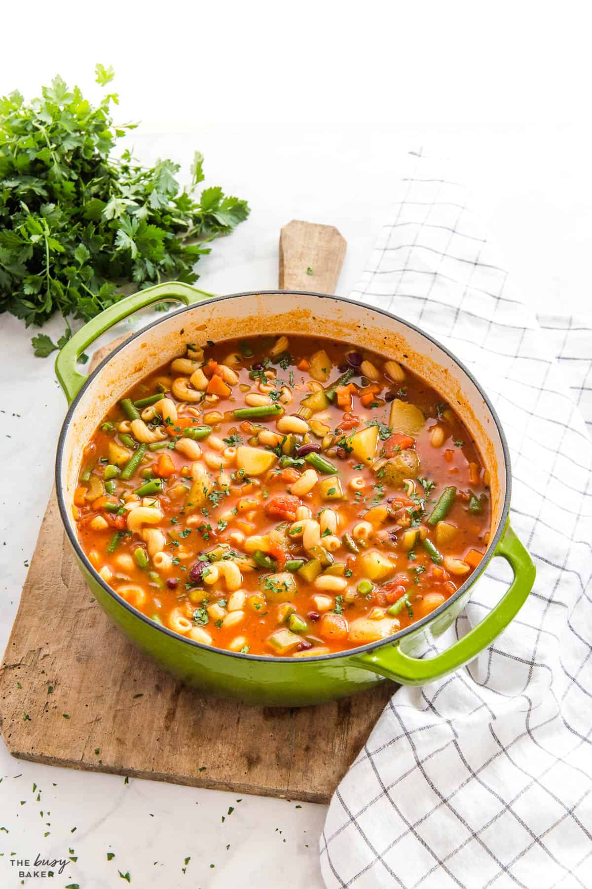 green Dutch oven pot with Minestrone soup