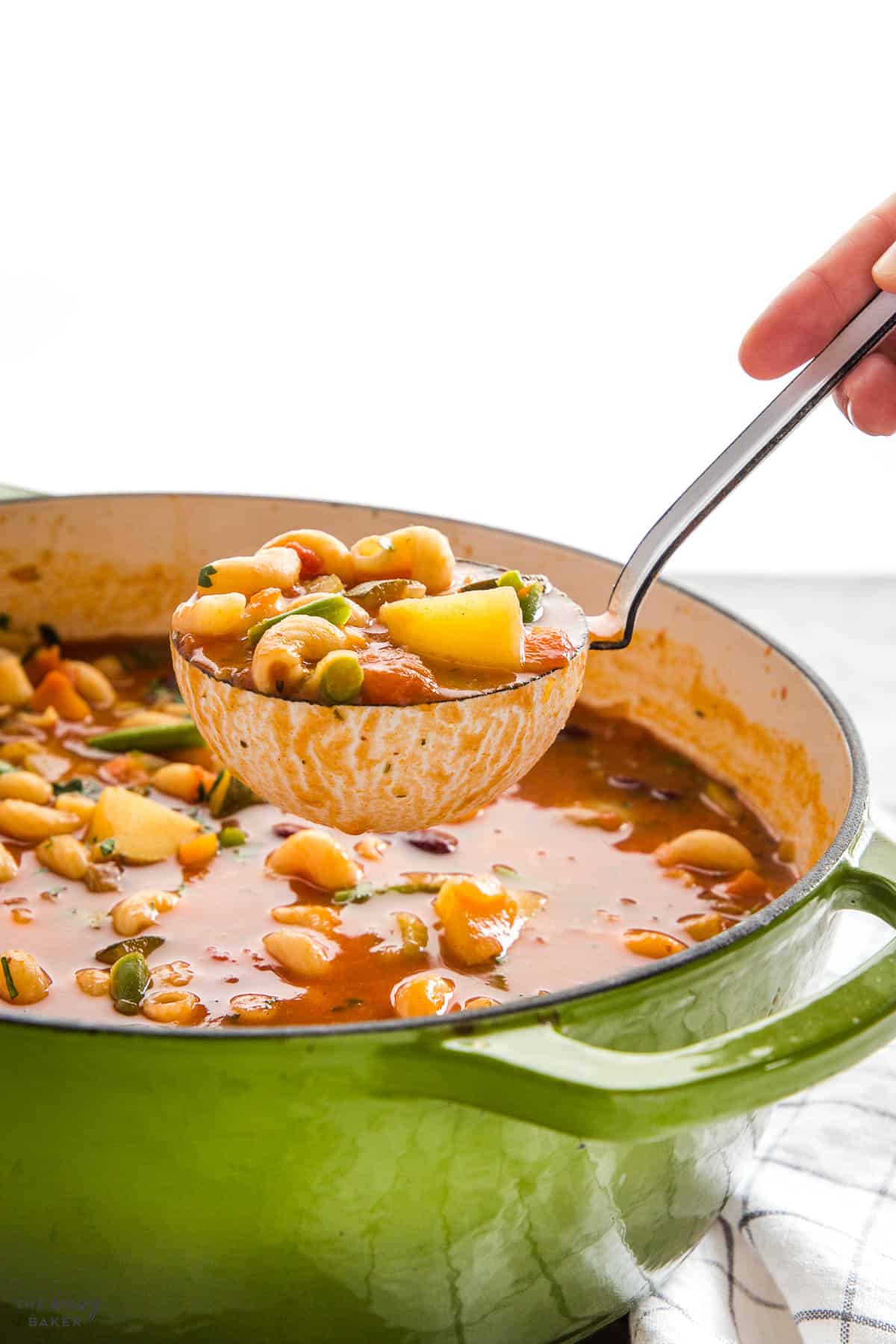 ladle of minestrone soup
