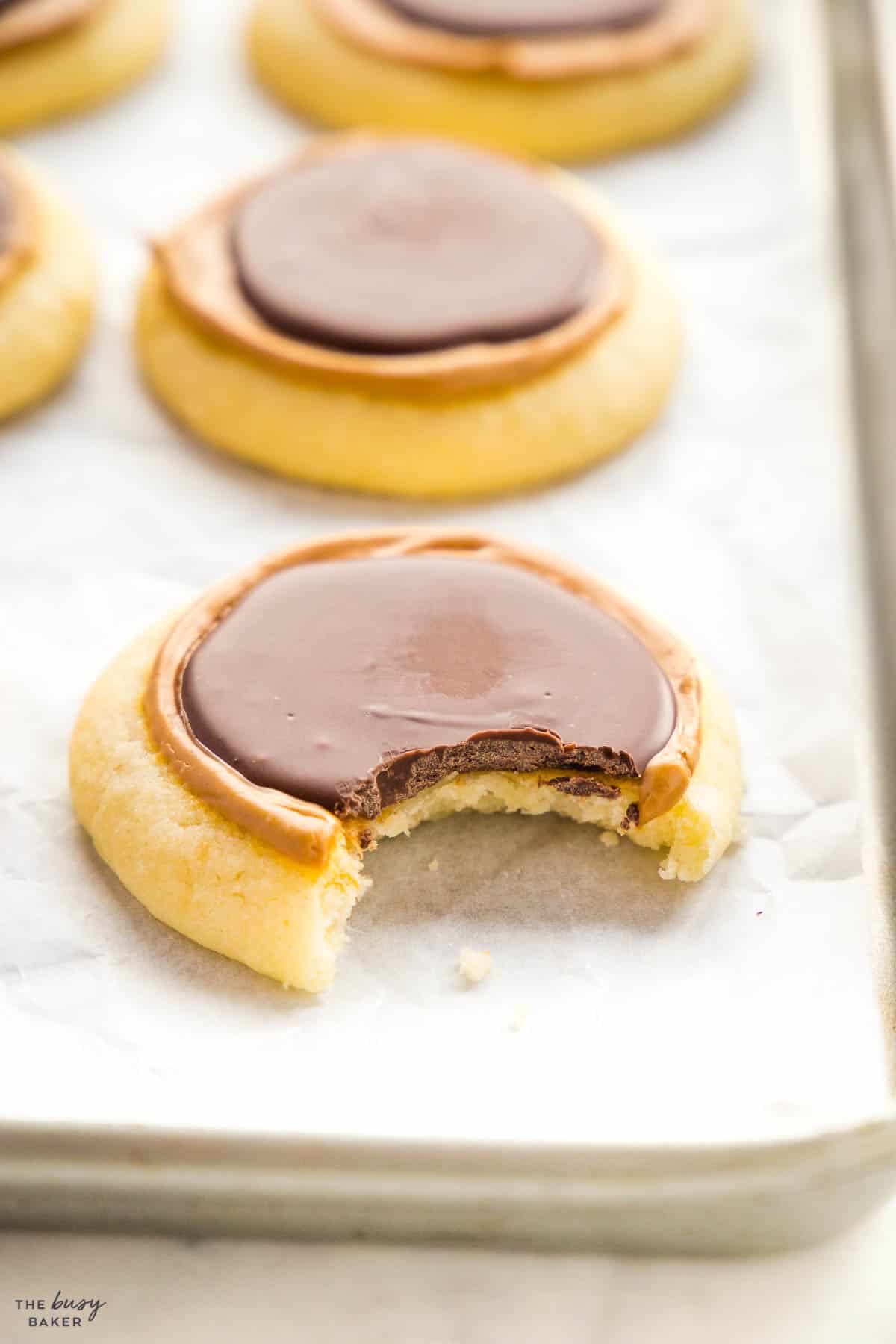 twix cookie recipe on a baking pan with chocolate and caramel