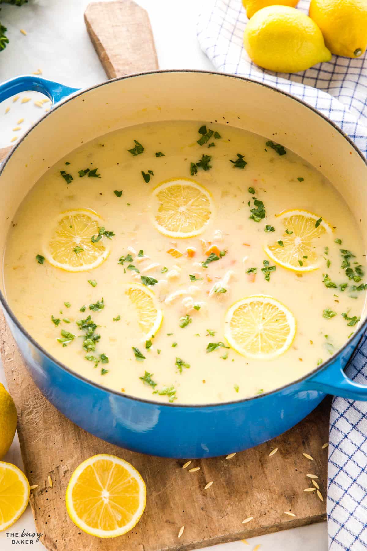 lemon chicken orzo soup in a blue pot