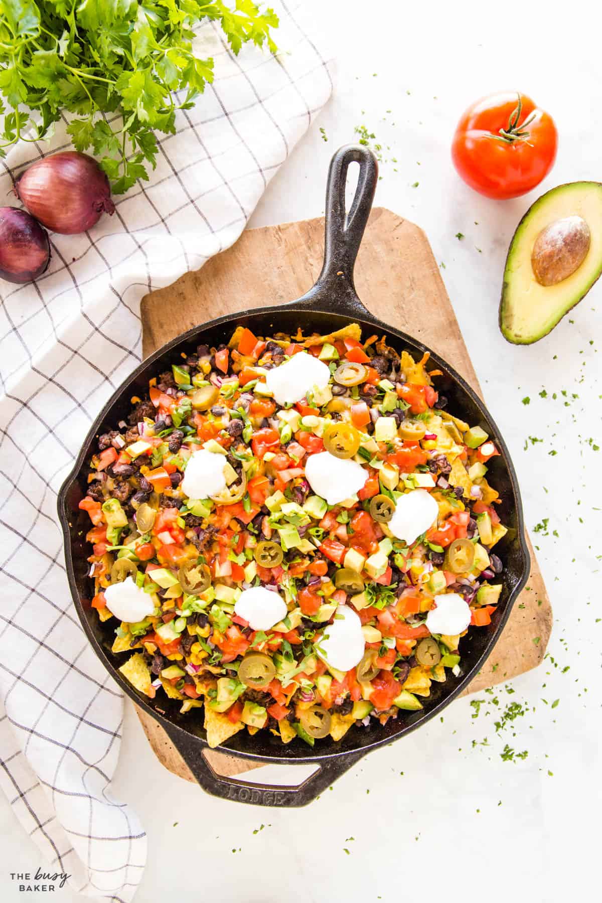overhead image: cast iron pan with loaded nachos