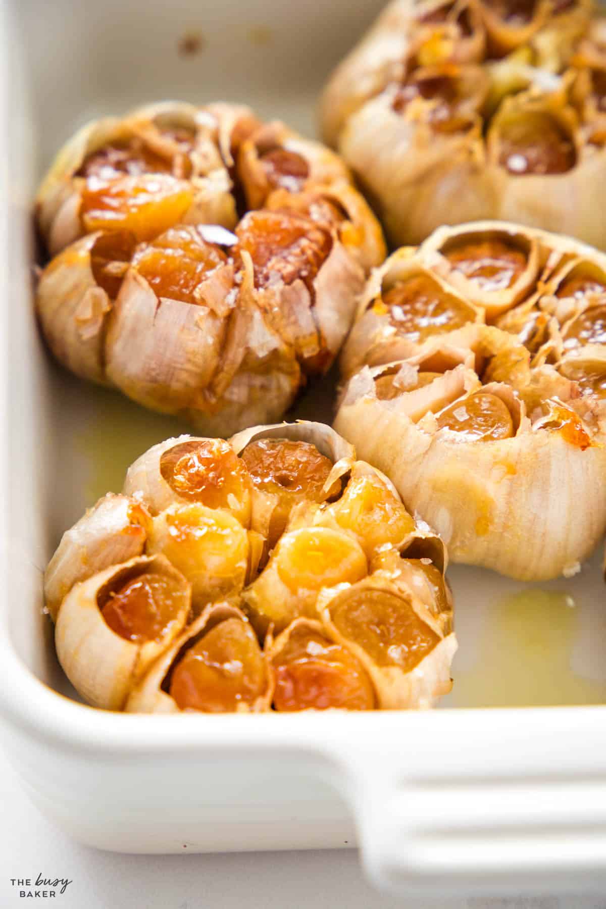 oven roasted garlic in a baking dish