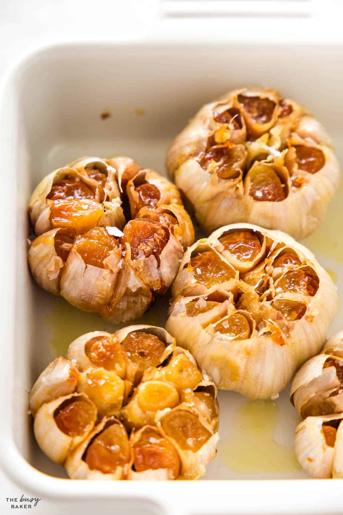 caramelized garlic in a baking dish