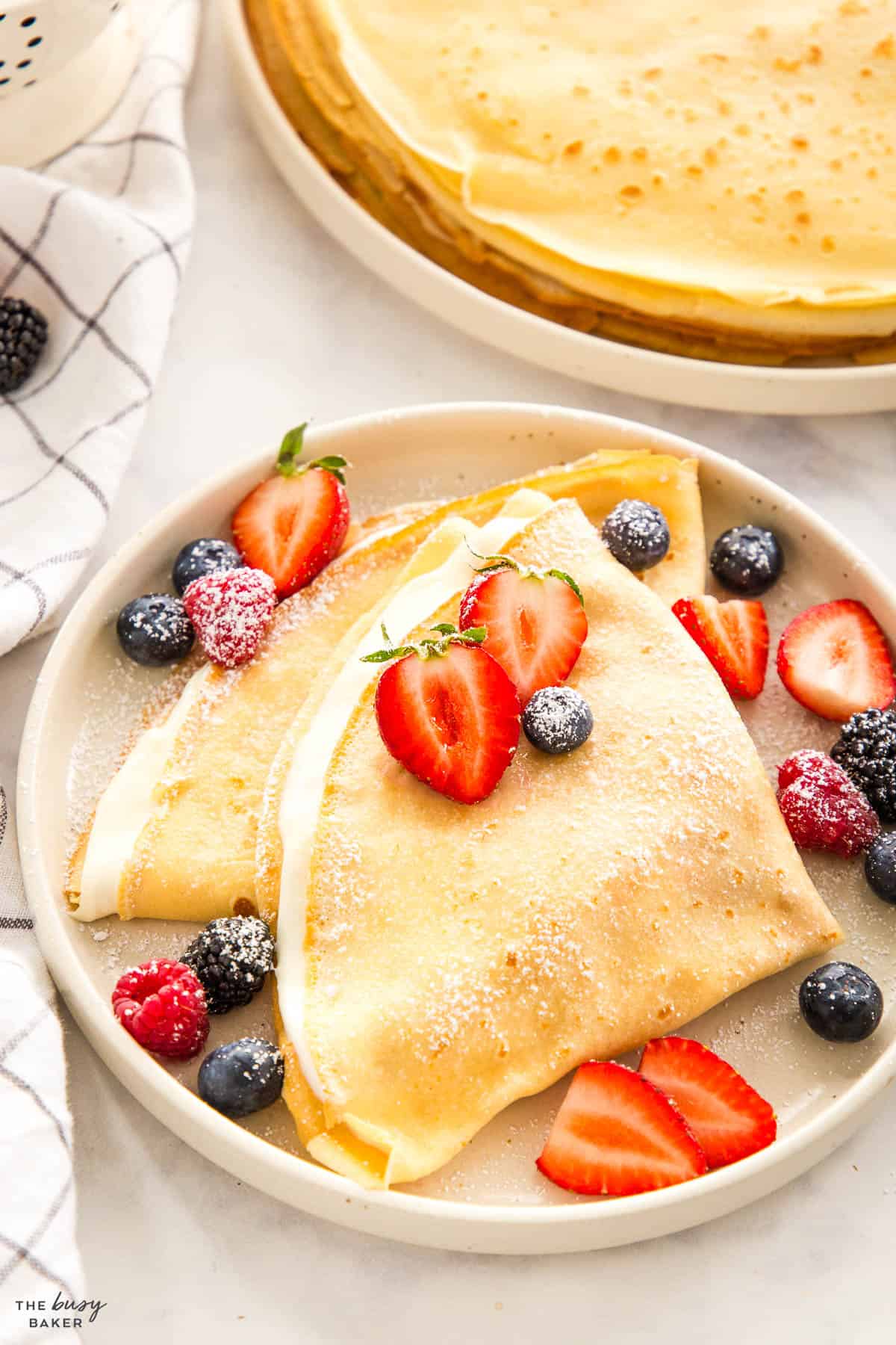 french crepes with berries and cheesecake filling