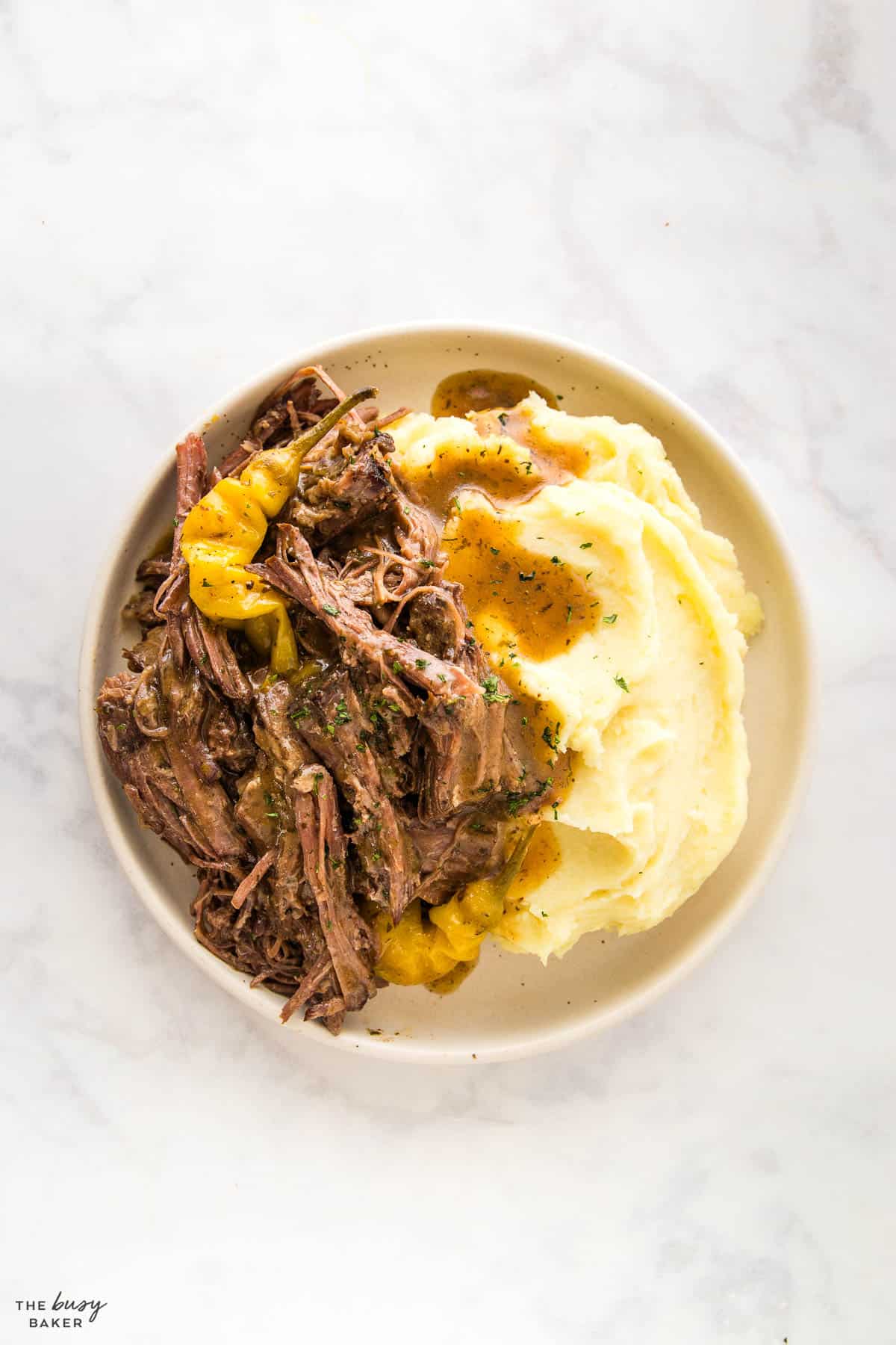 mashed potatoes and shredded beef with sauce