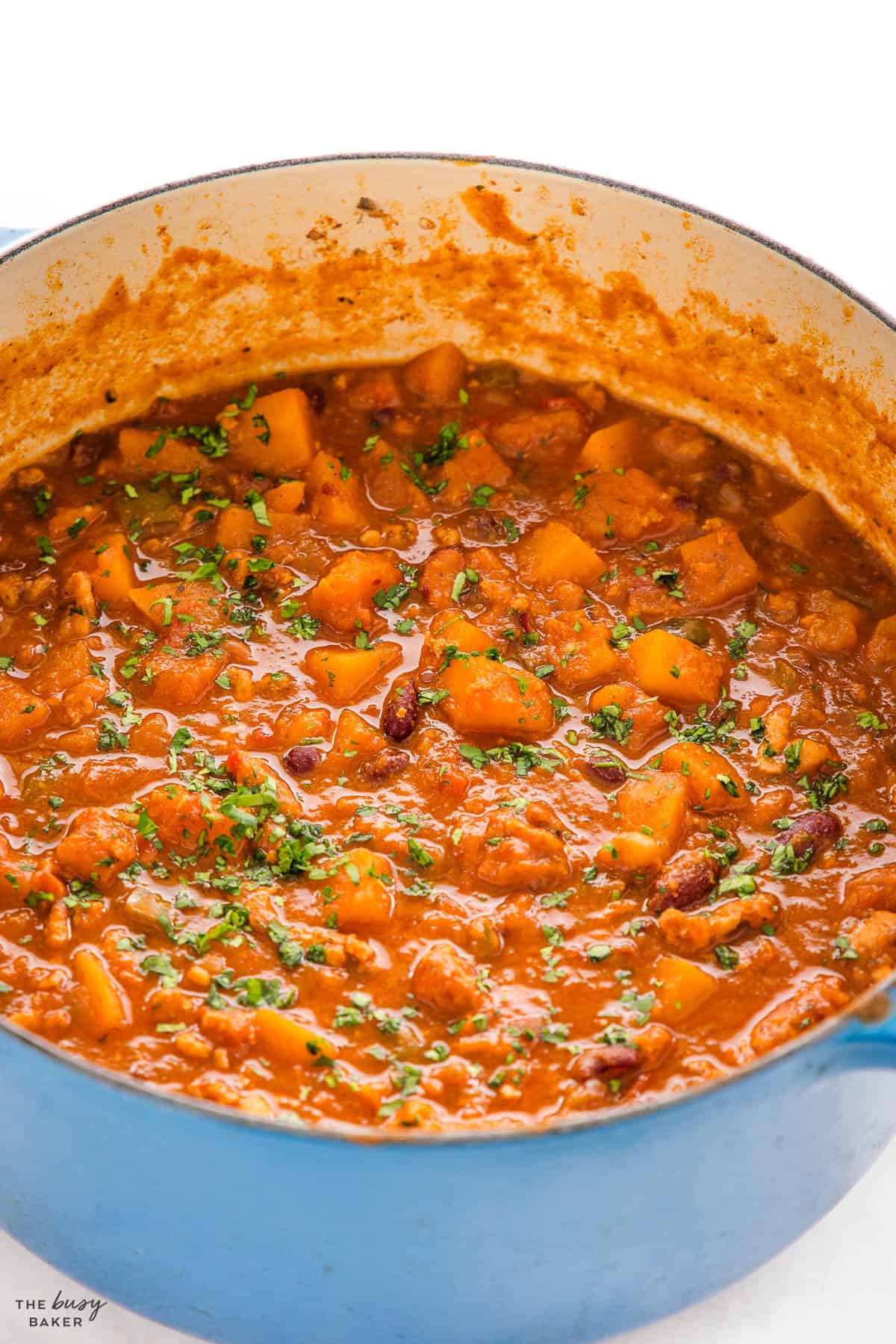 turkey pumpkin chili recipe in a cast iron pot