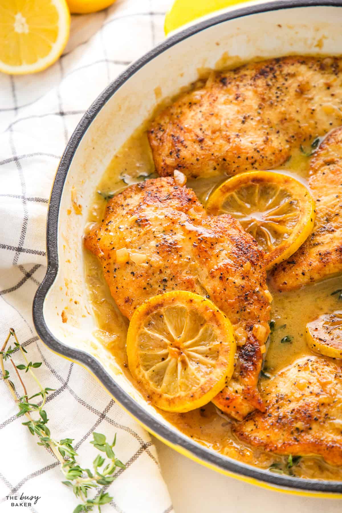 golden brown chicken cutlet in lemon sauce