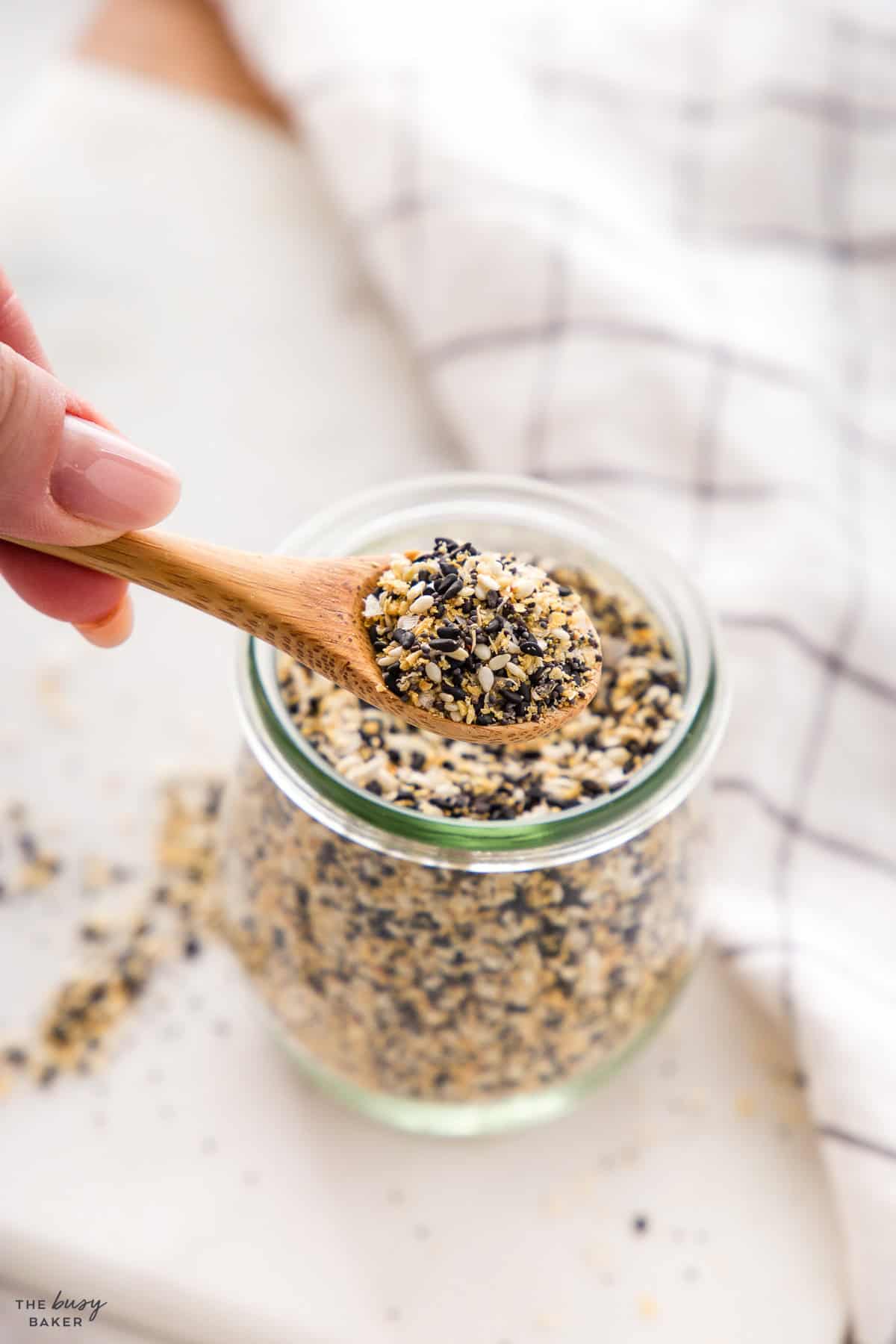 spoonful of spice mixture with seeds