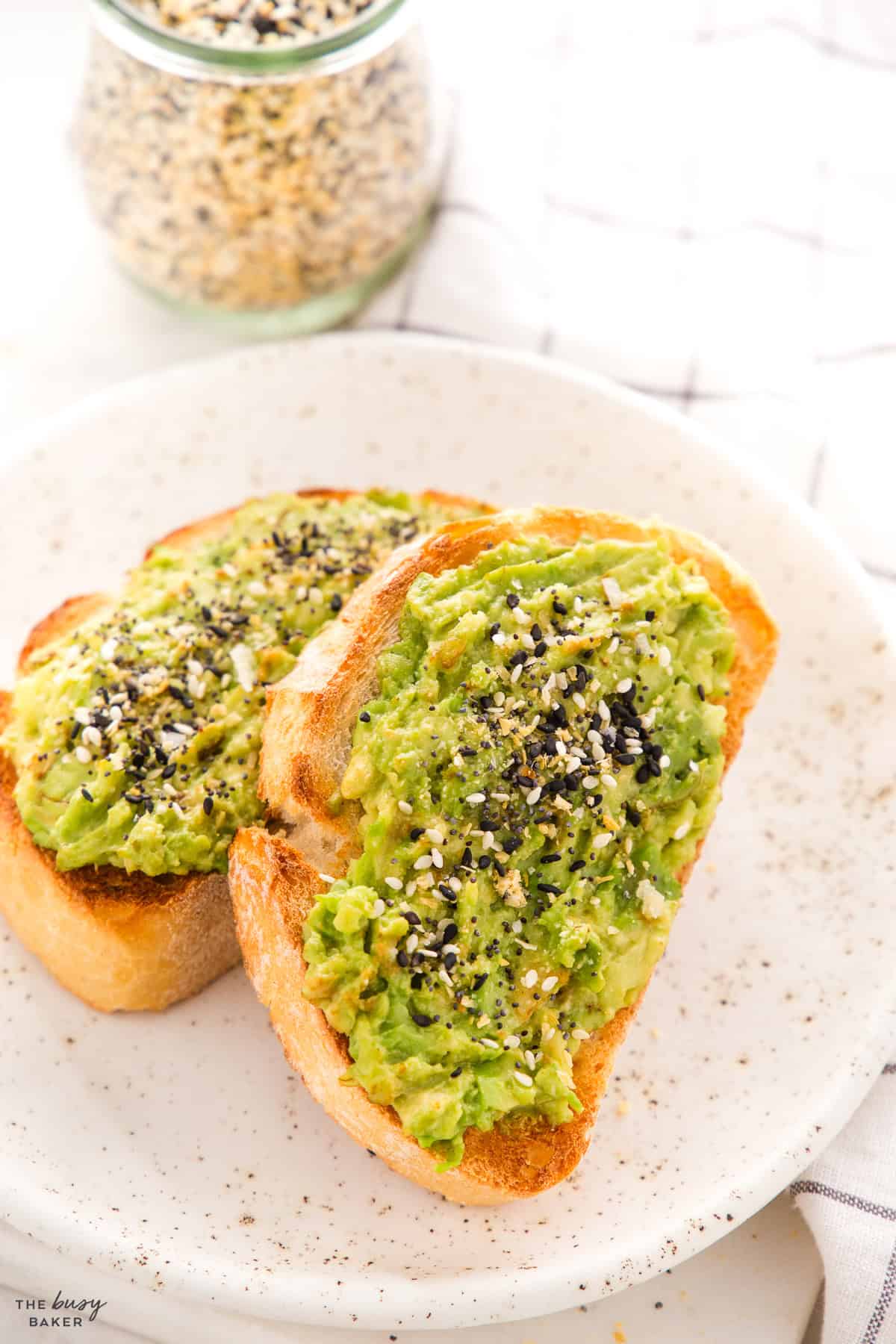 avocado toast on a speckled plate