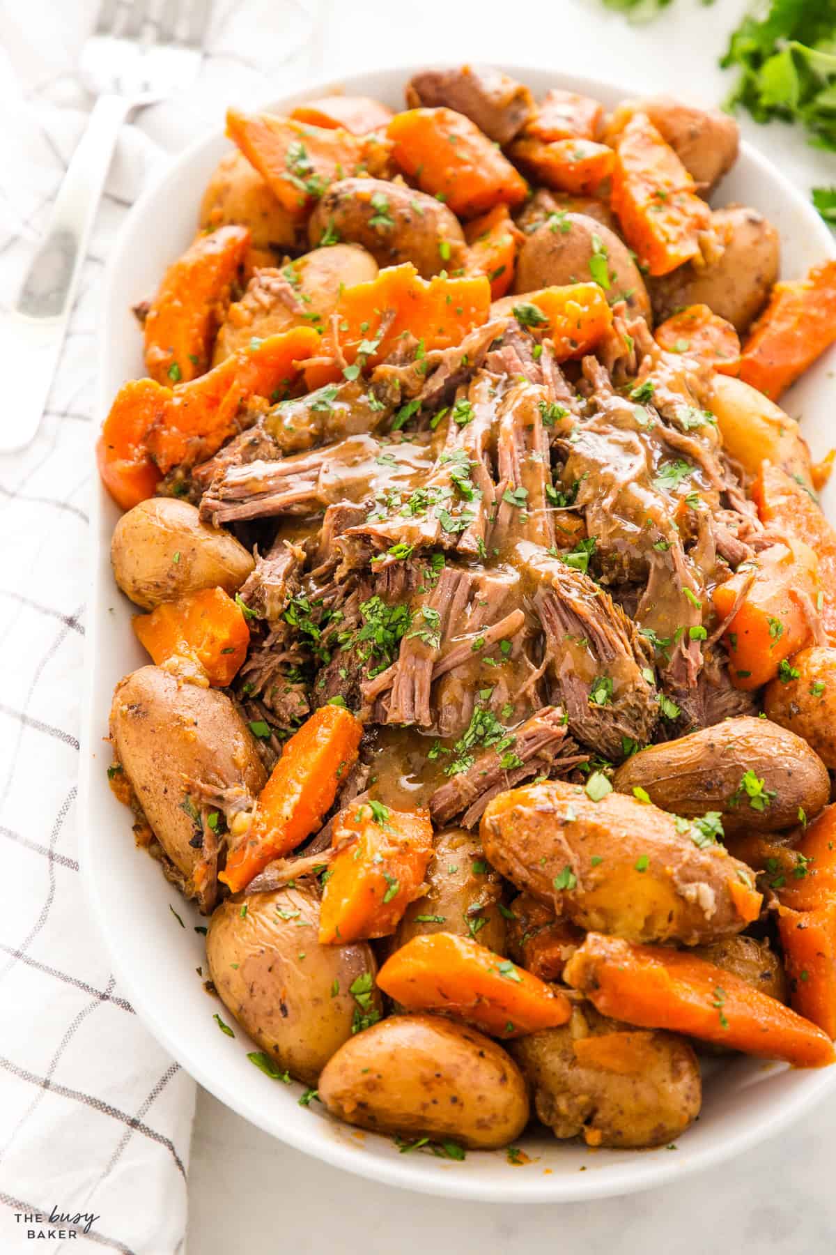 platter of shredded beef pot roast with veggies