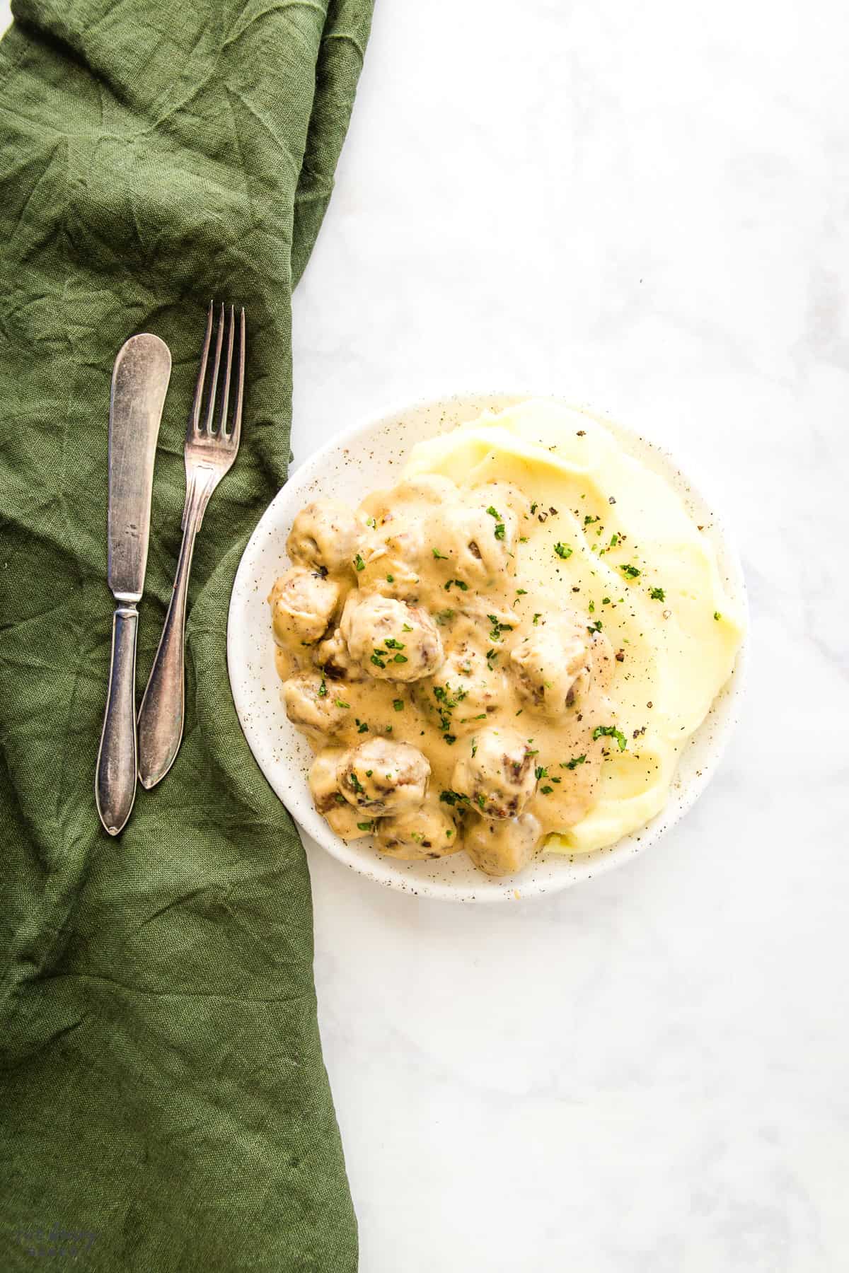 overhead image: plate with Swedish meatballs and mashed potatoes