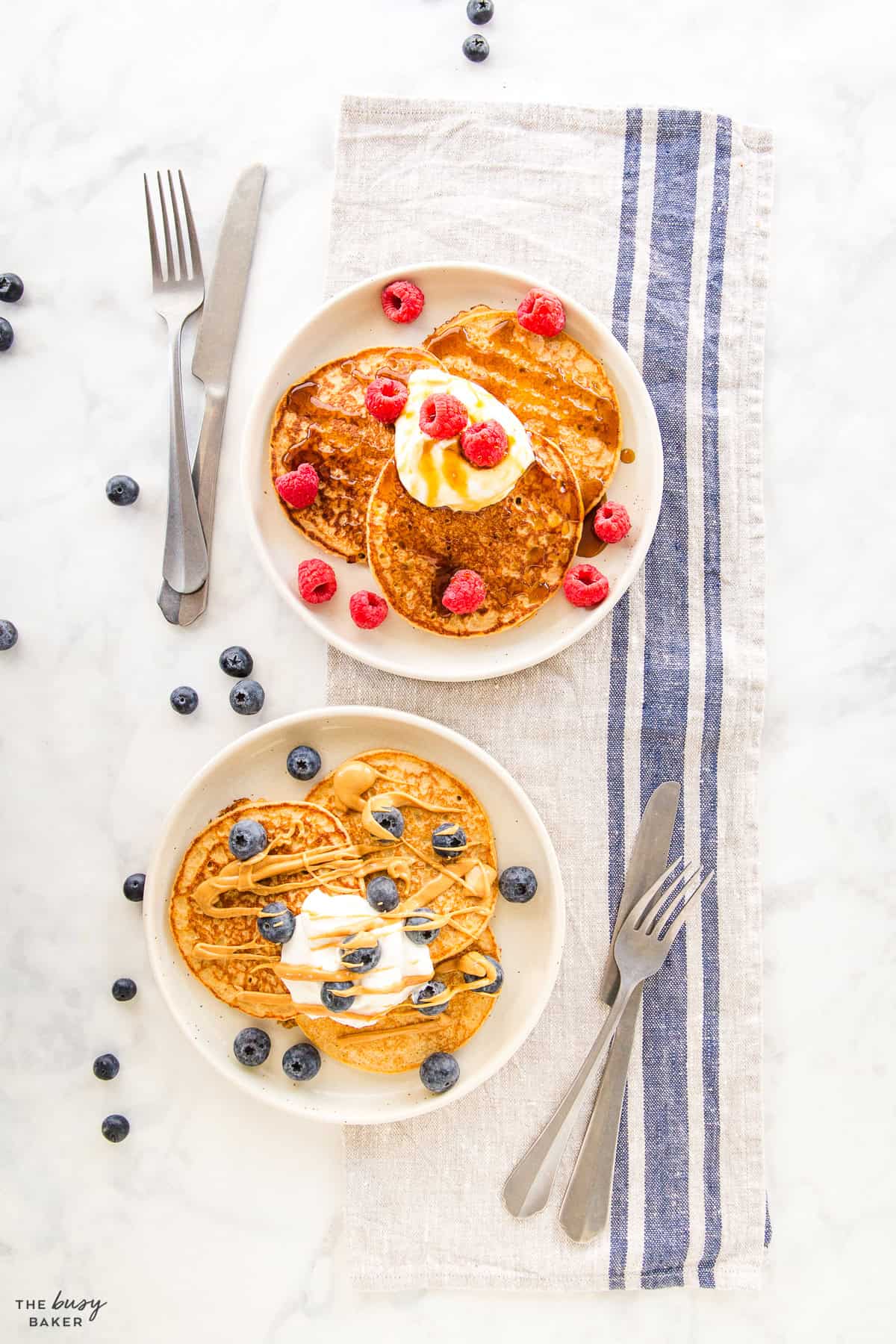 overhead image: protein pancakes with berries and Greek yogurt