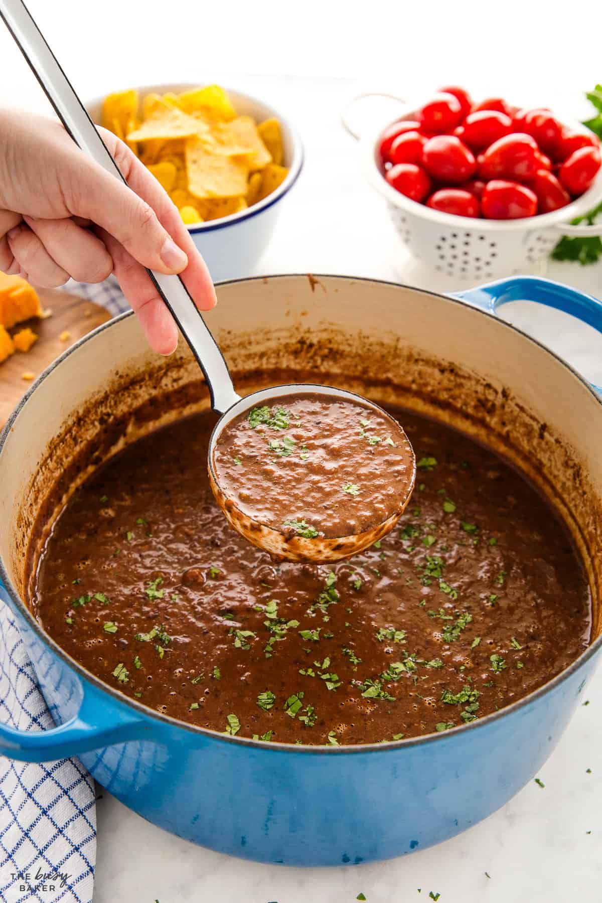 ladle serving bean soup