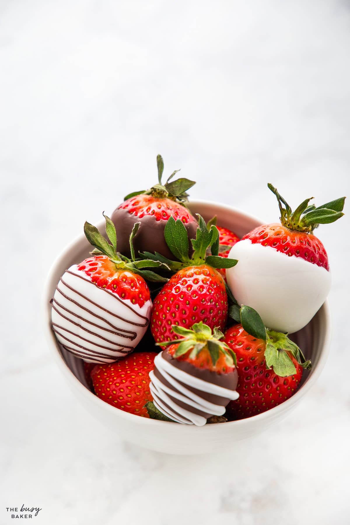 chocolate dipped strawberries in a bowl