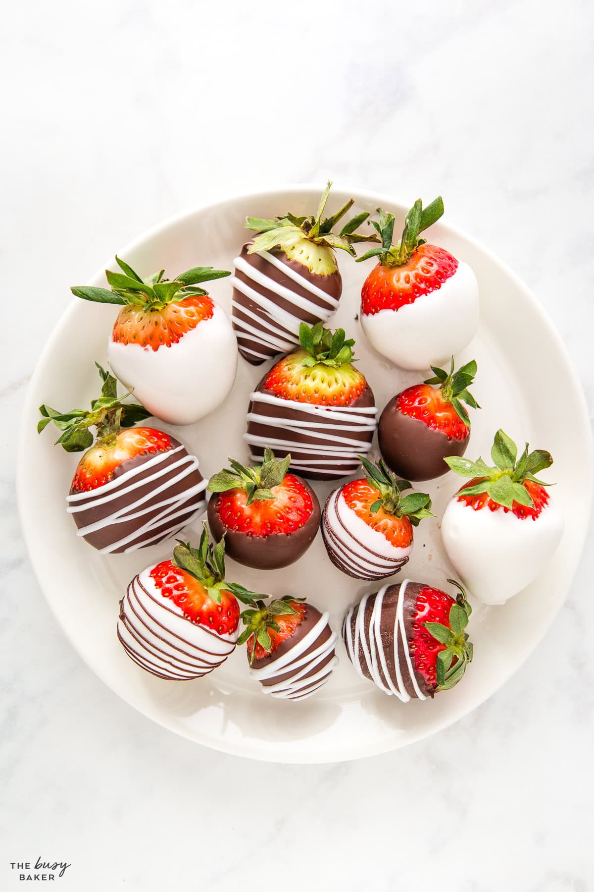 chocolate strawberries on a white plate