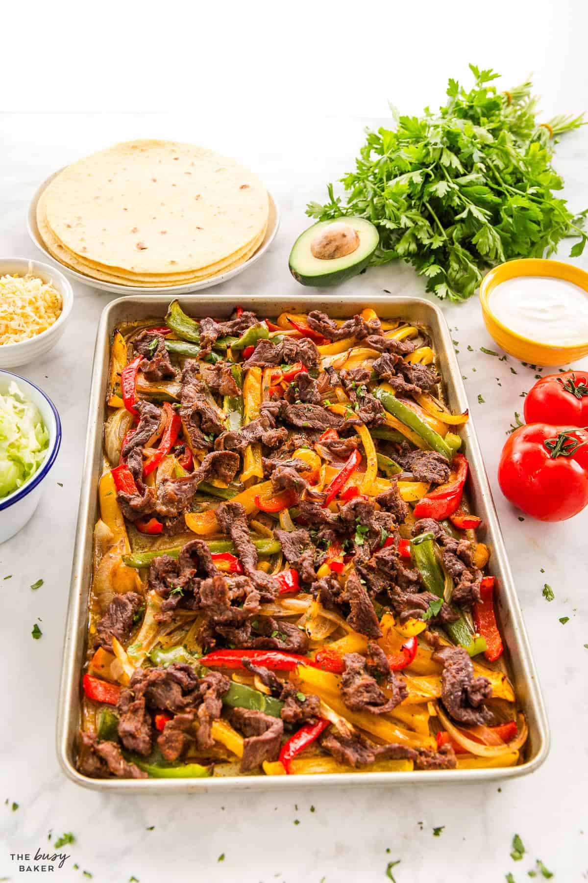 steak and veggies on a sheet pan