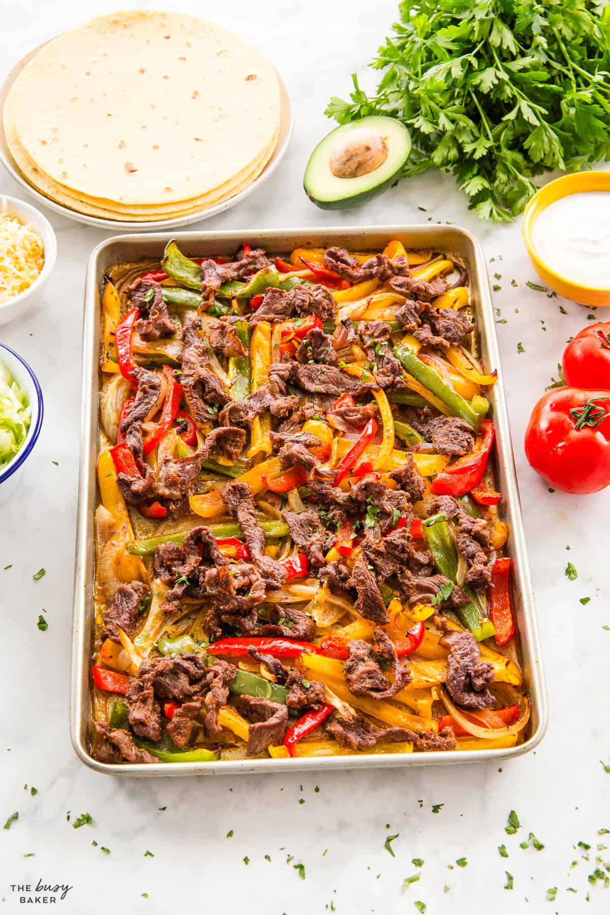 steak fajitas on a sheet pan