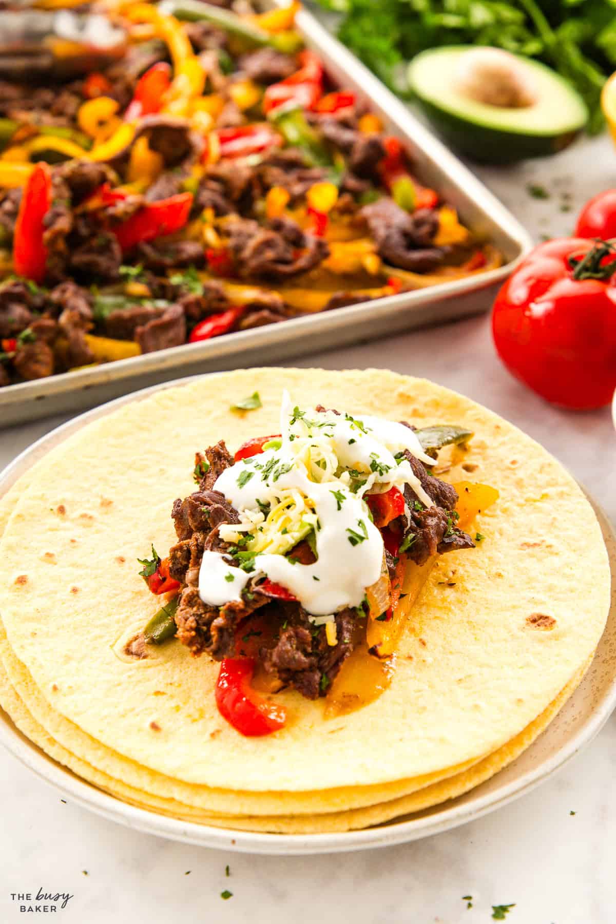 corn tortillas with steak fajitas filling