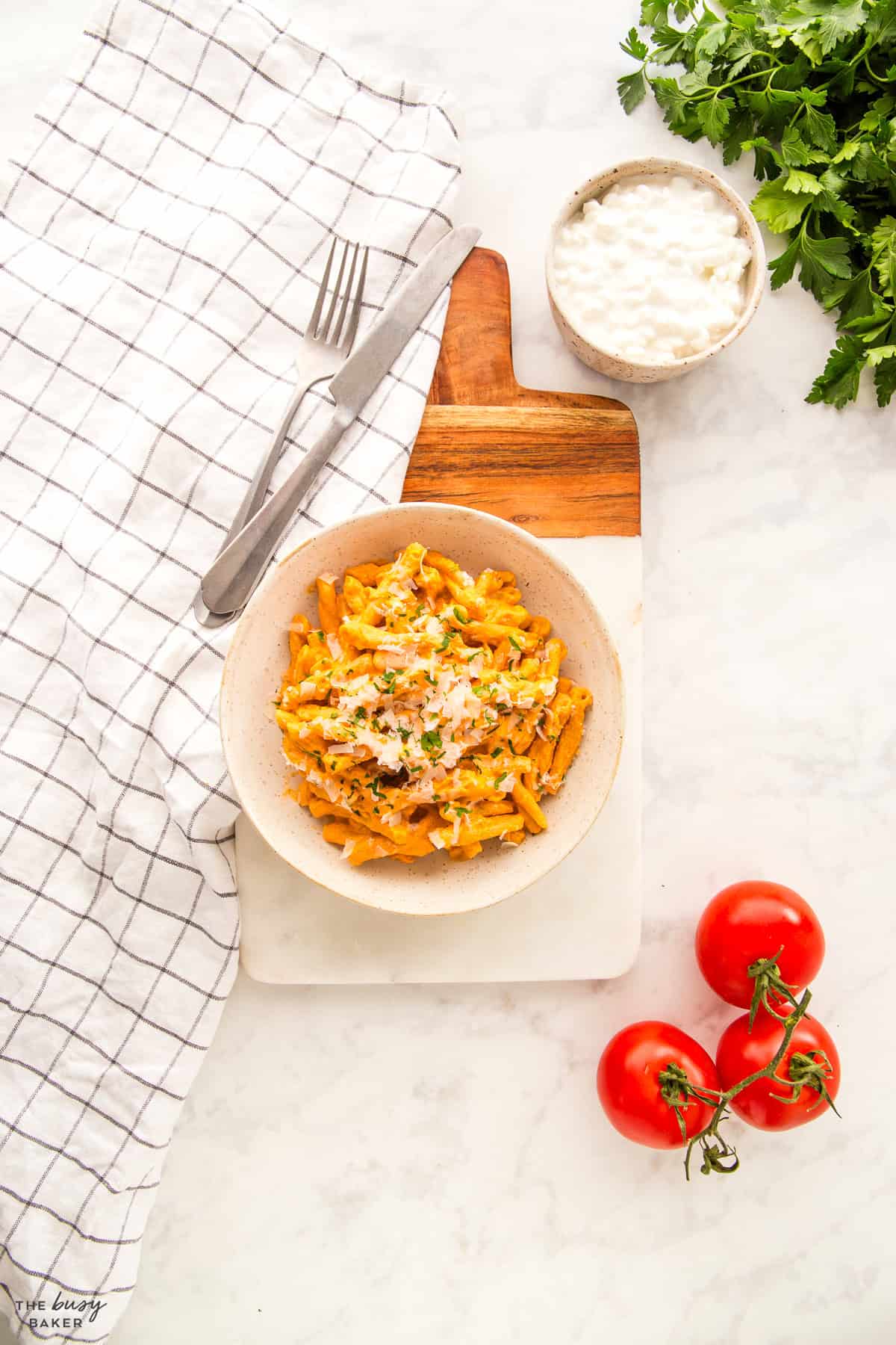 overhead image: protein pasta in a bowl with parmesan cheese