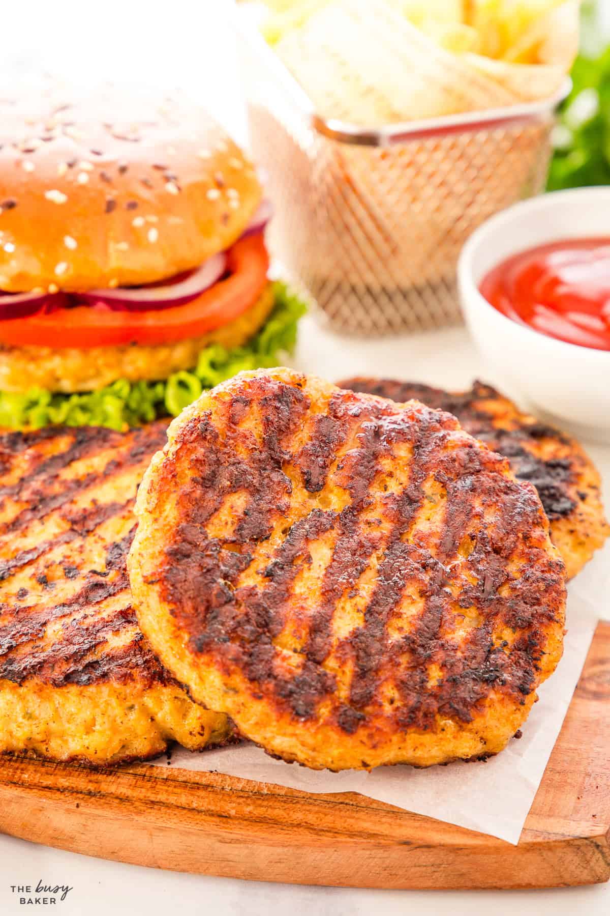 grilled chicken burgers on a platter
