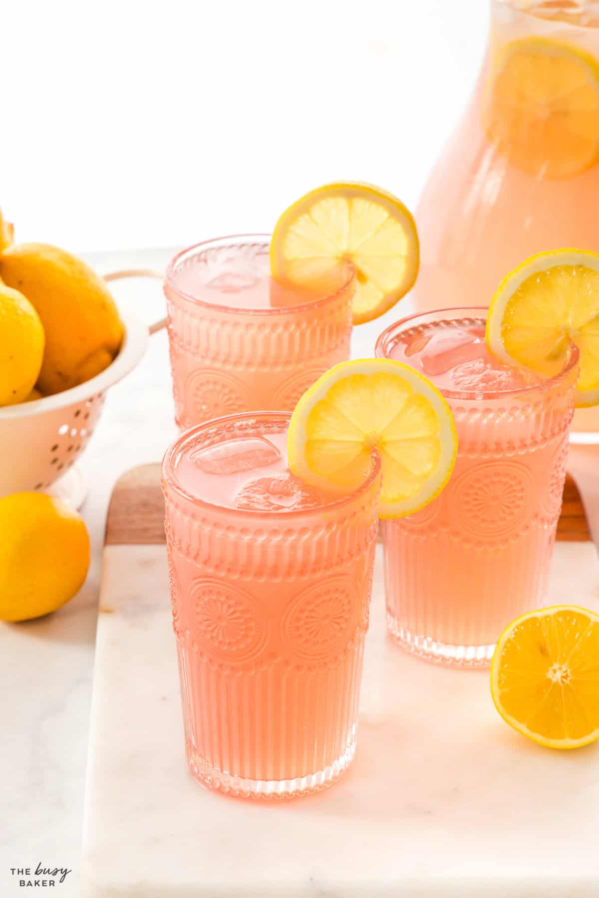 pink lemonade in cute glasses with lemon slices