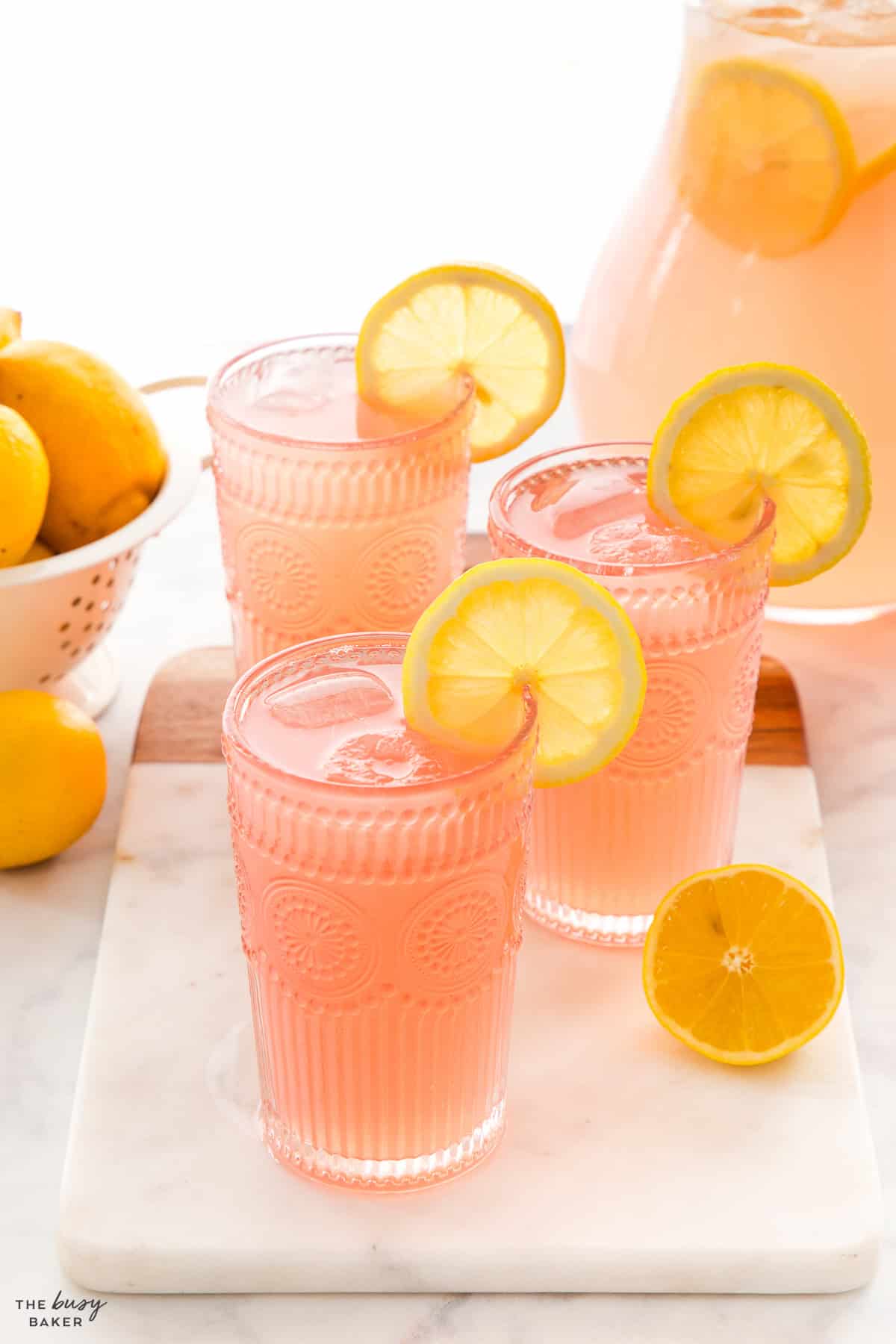 summer drinks in pretty glasses with lemon slices