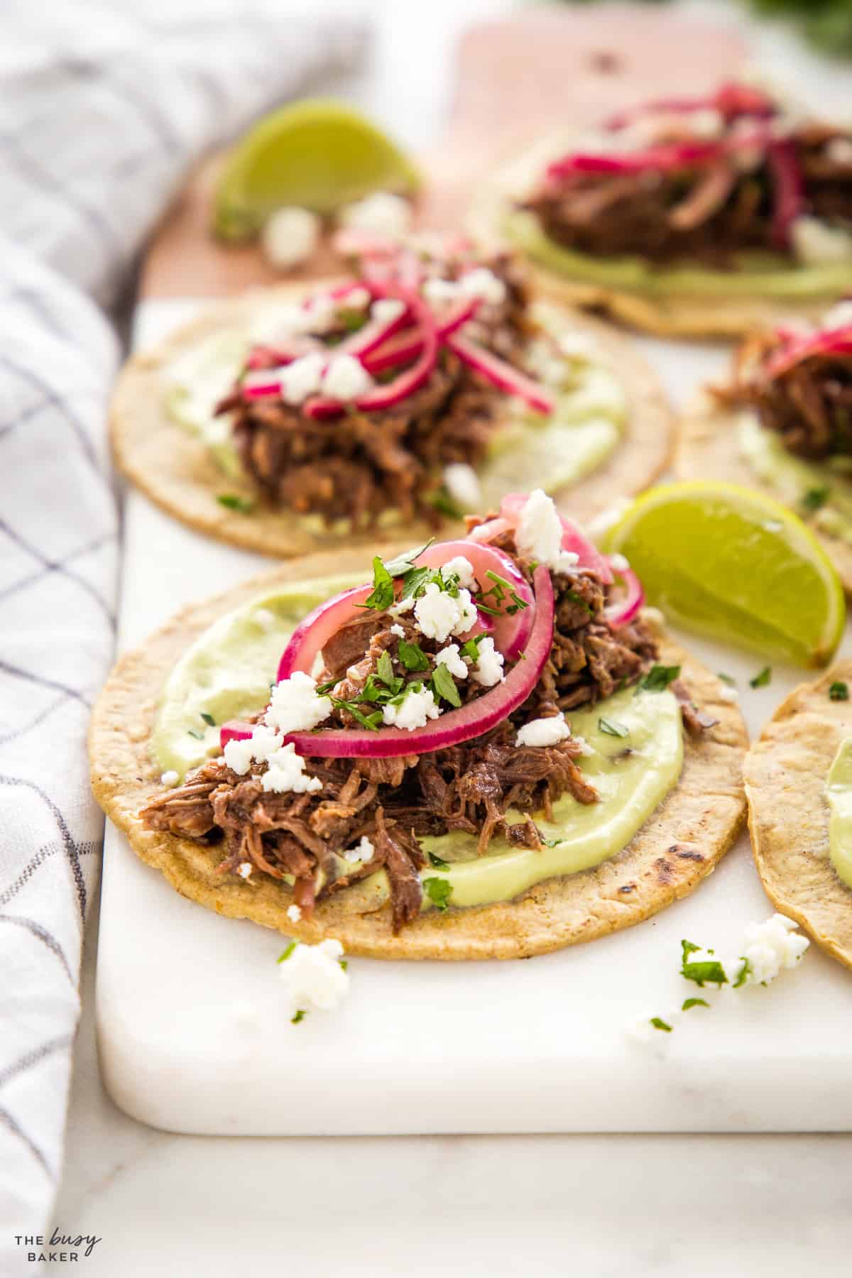shredded slow cooker barbacoa beef tacos