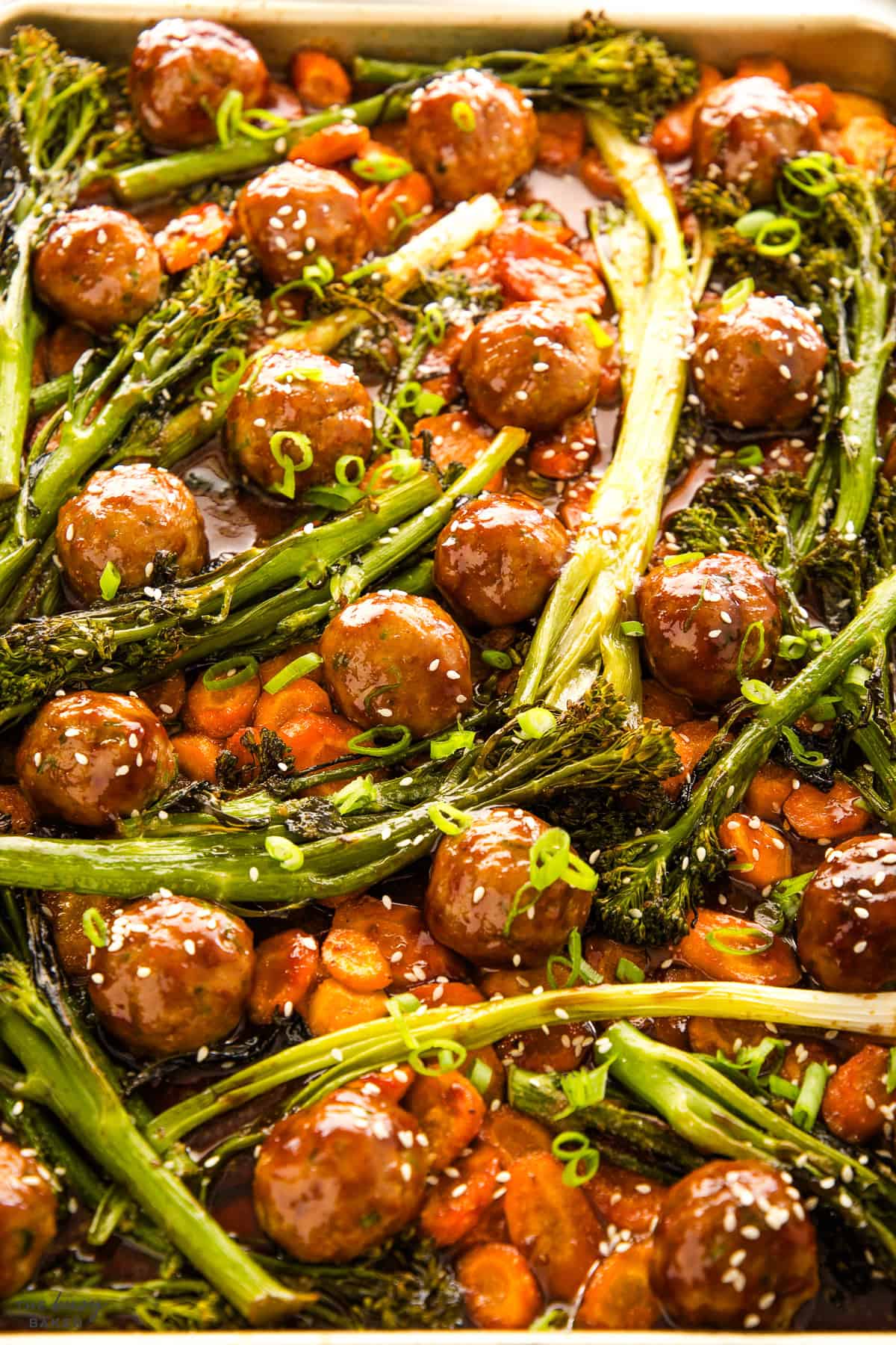 meatballs and veggies on a sheet pan