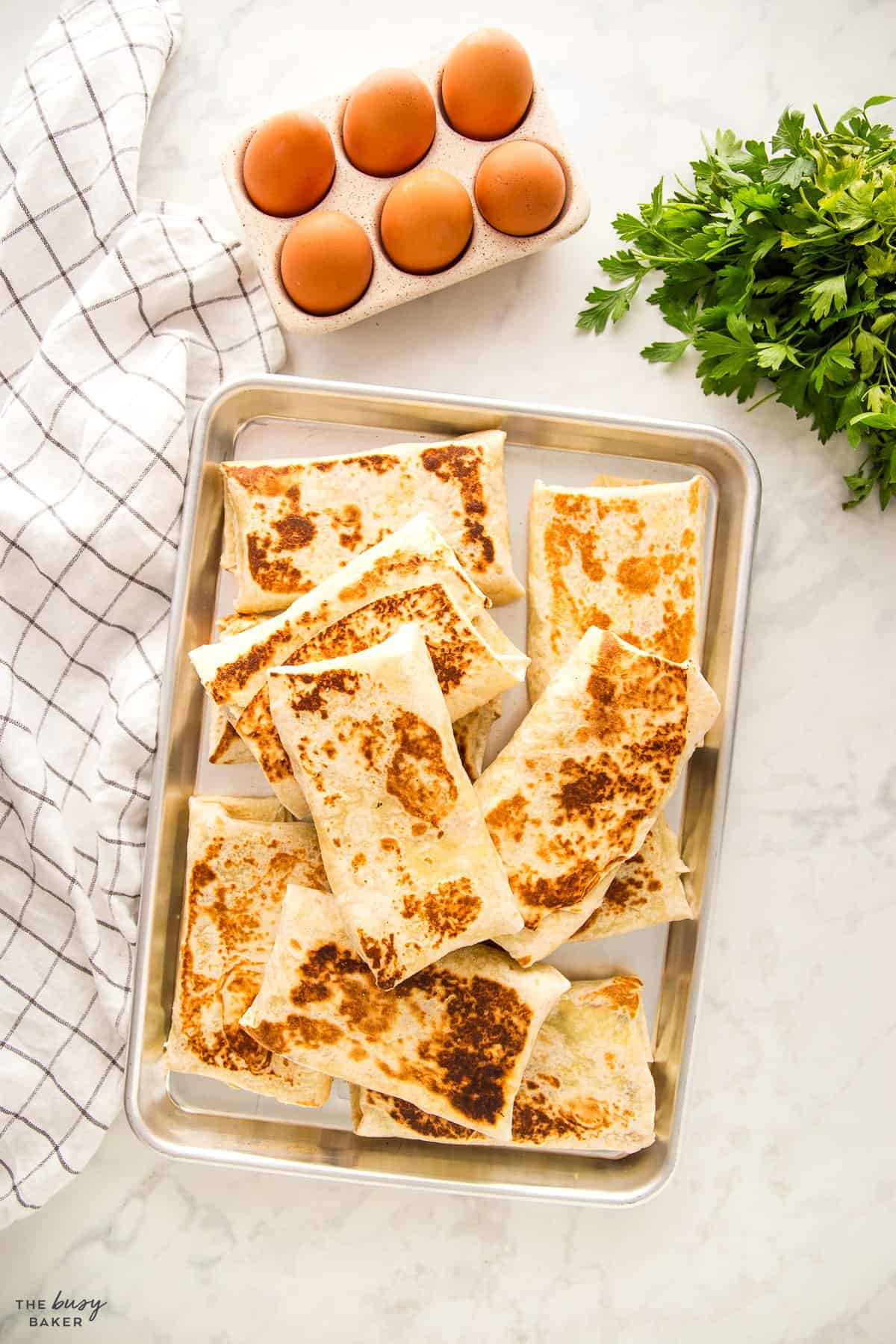tray of breakfast burritos