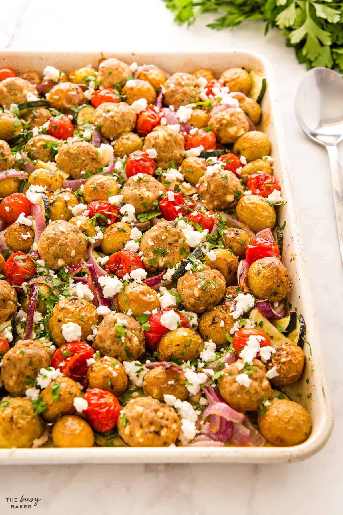 meatballs and veggies on a sheet pan