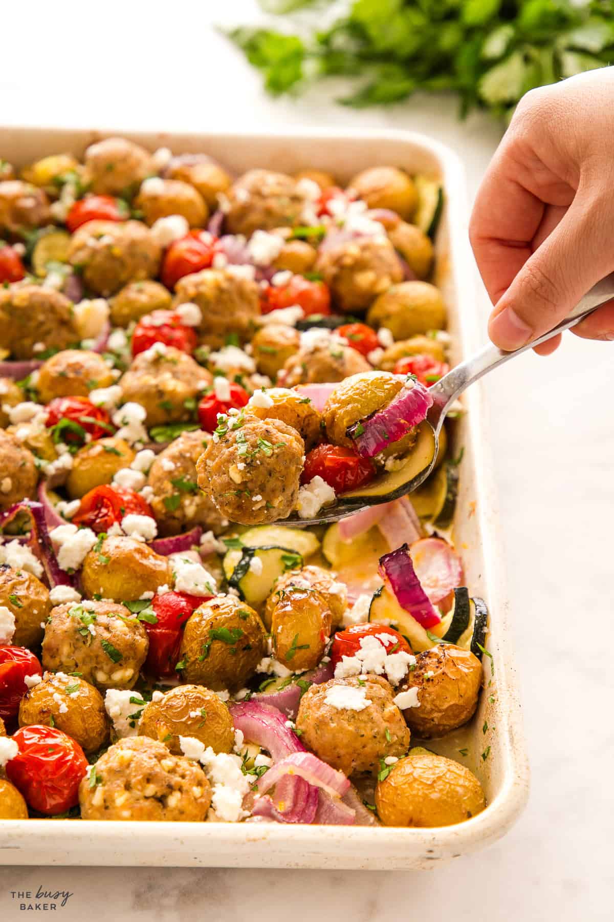 Greek-style meatballs sheet pan dinner