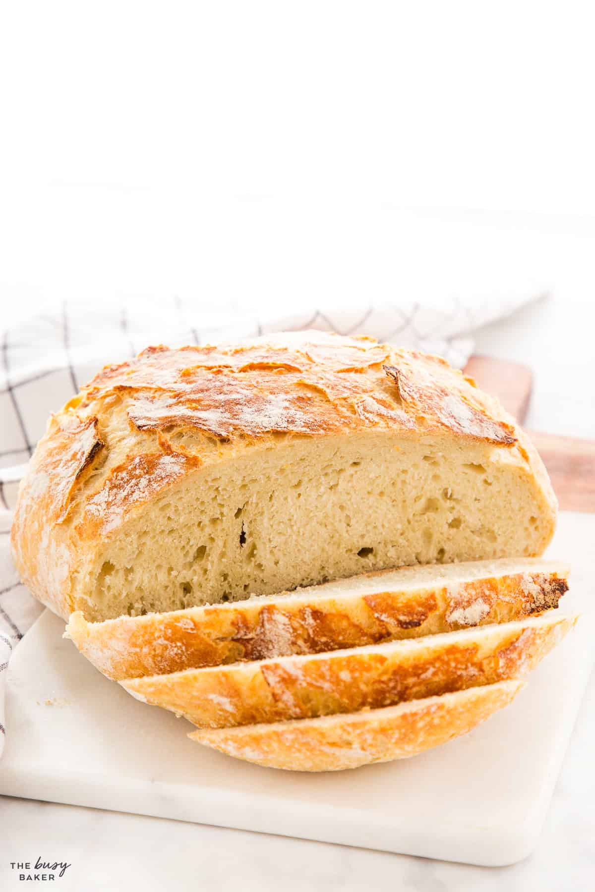 load of homemade crusty bread on a board