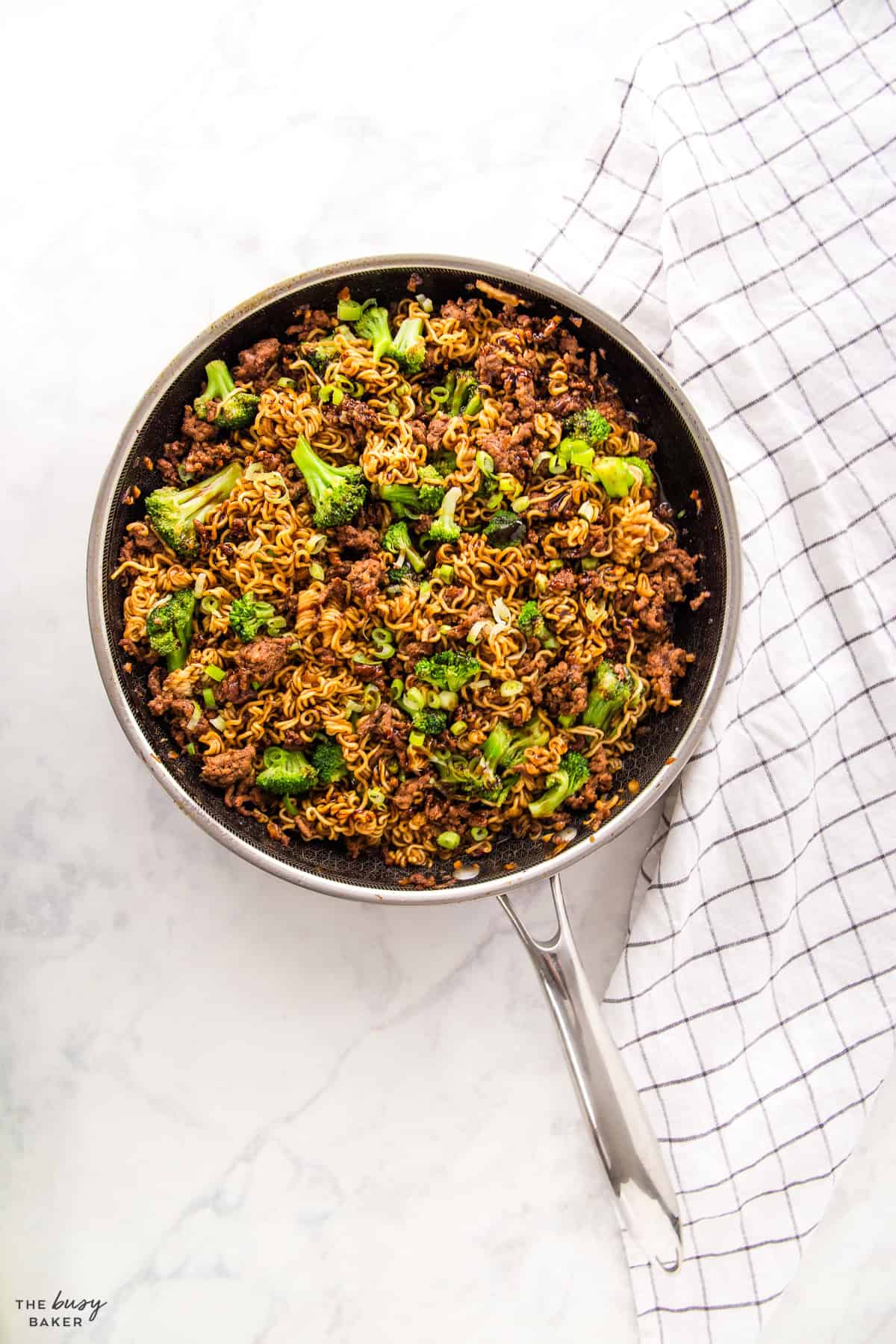 overhead image: pan with beef and broccoli ramen