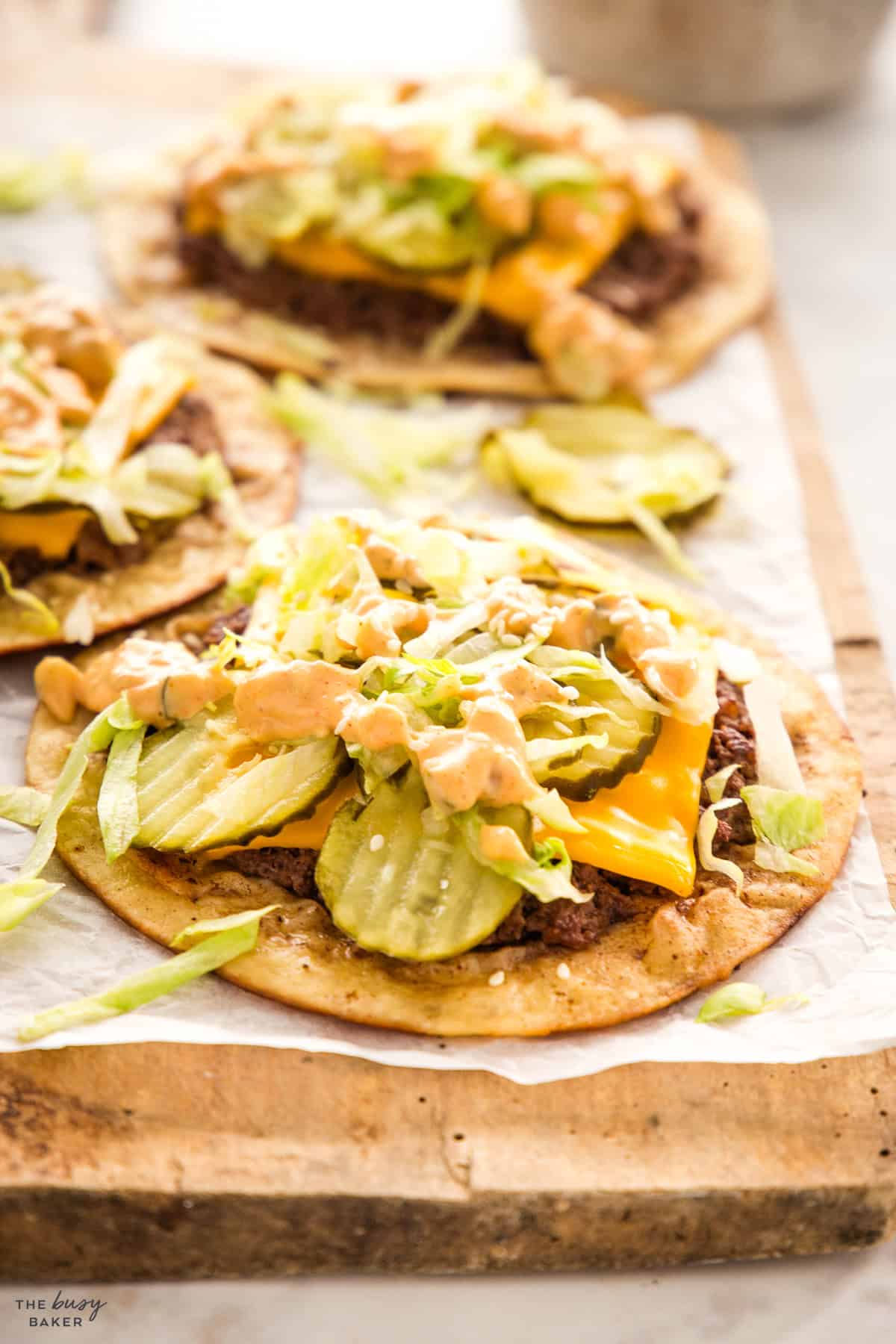 smash burger tacos on a board ready to serve