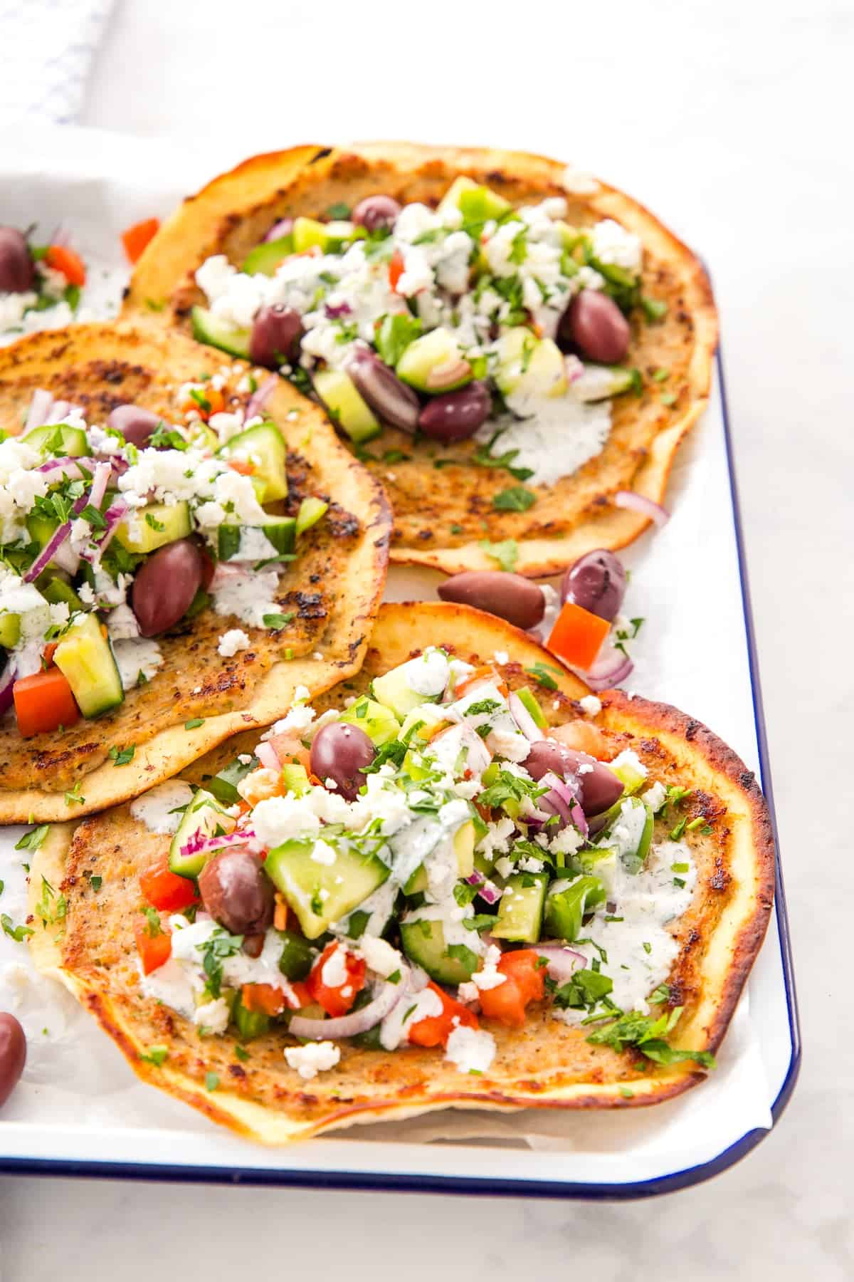 crispy smash taco with greek salad