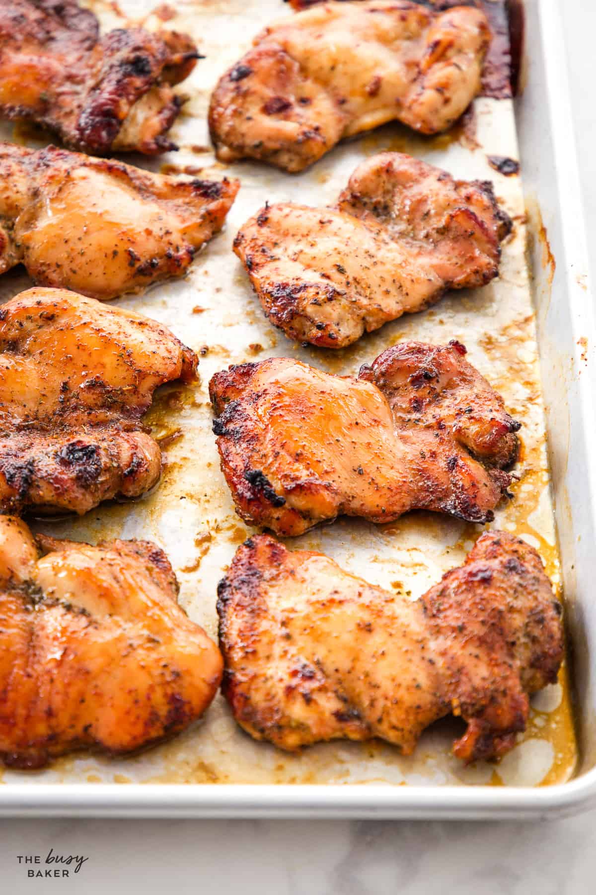 baked chicken thighs on a sheet pan