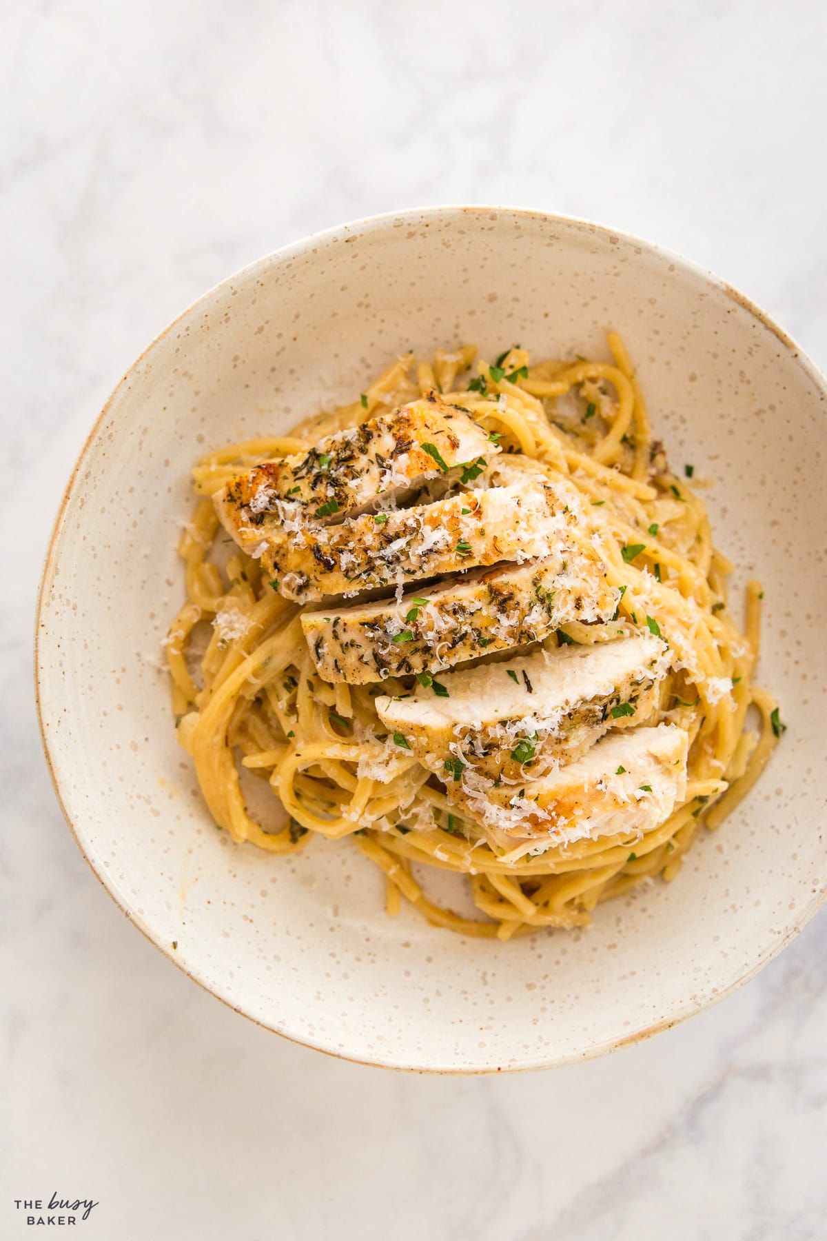bowl of garlic parmesan pasta with chicken