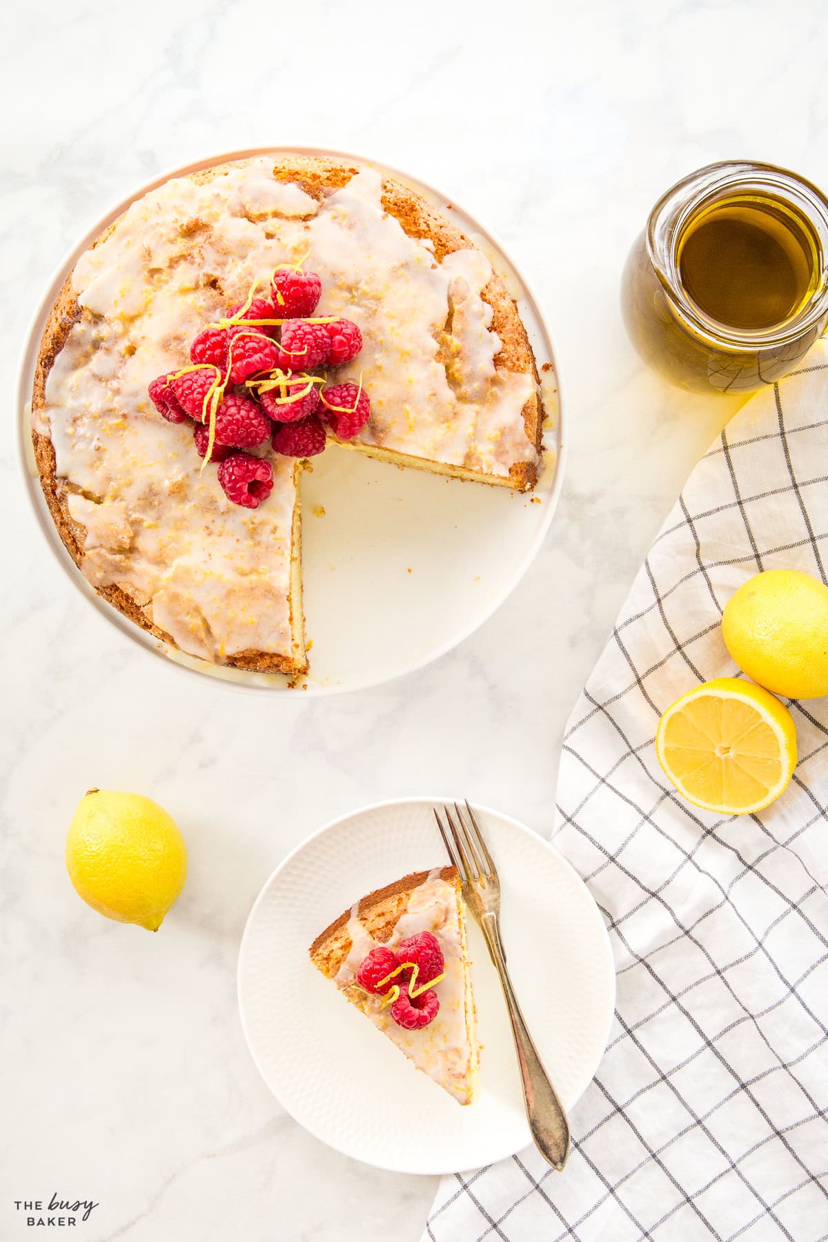 overhead image olive oil cake with raspberries