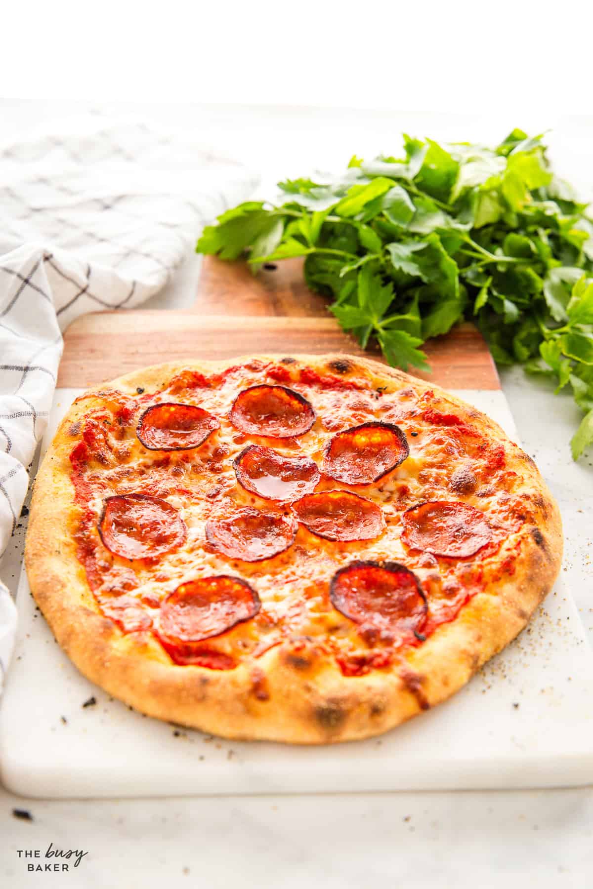 pepperoni wood fired pizza on board