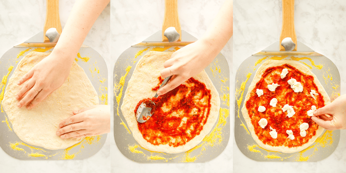 making pizza on a pizza peel with sauce and cheese